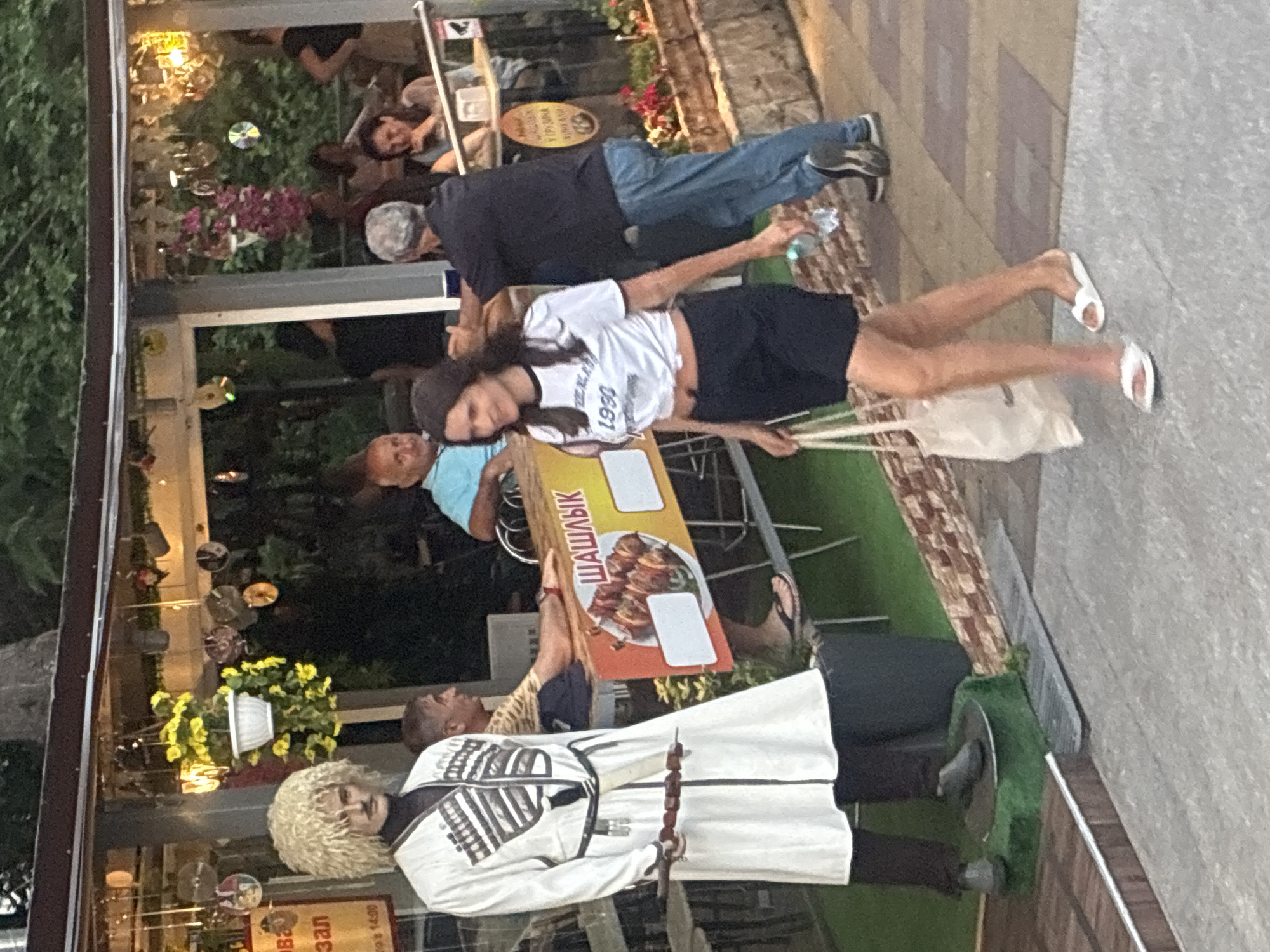 Sochi beachfront at golden hour — cafés, cruise ships, and shoreline