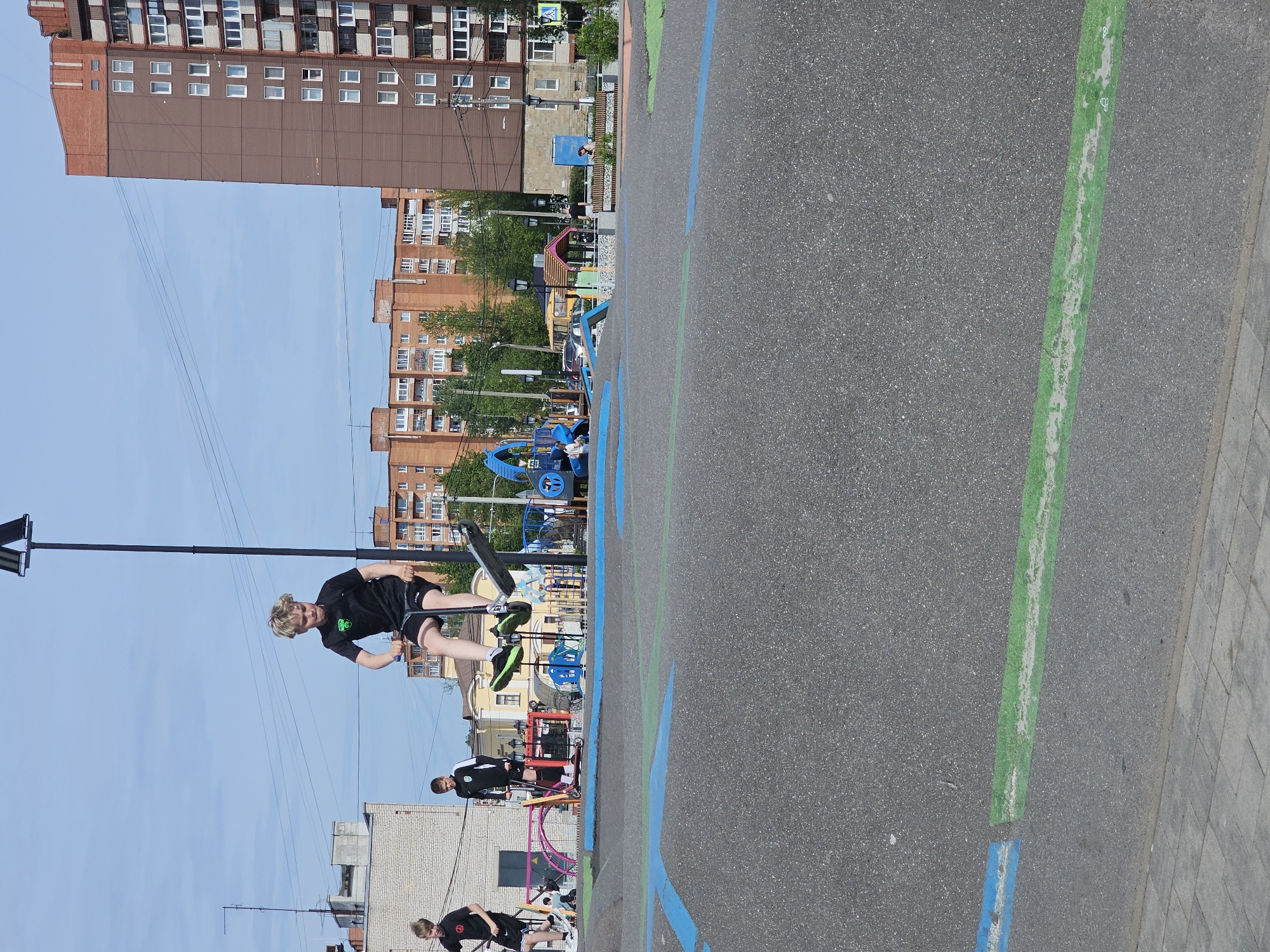 Youth skateboarding and socializing in Tosno, Russia
