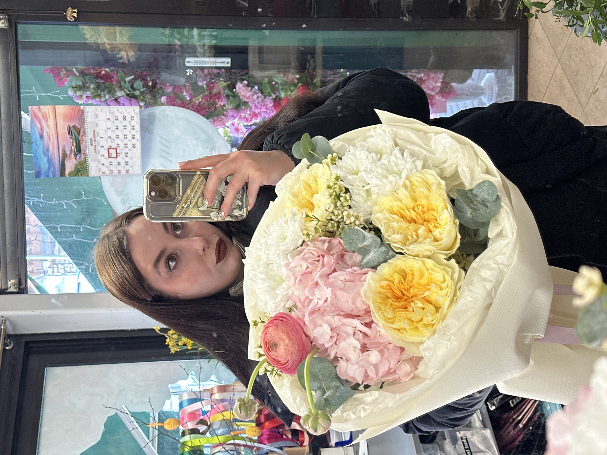 Woman Takes Flower Bouquet Selfie in Liepaja