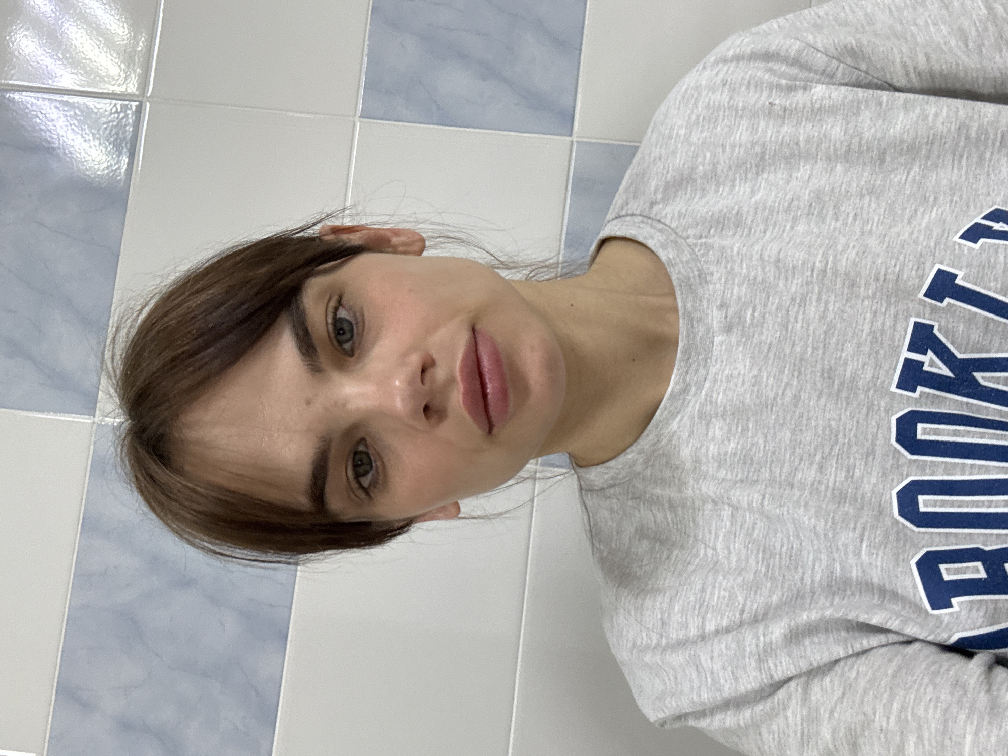 Woman in Brooklyn sweatshirt spotted in Anapa bathroom