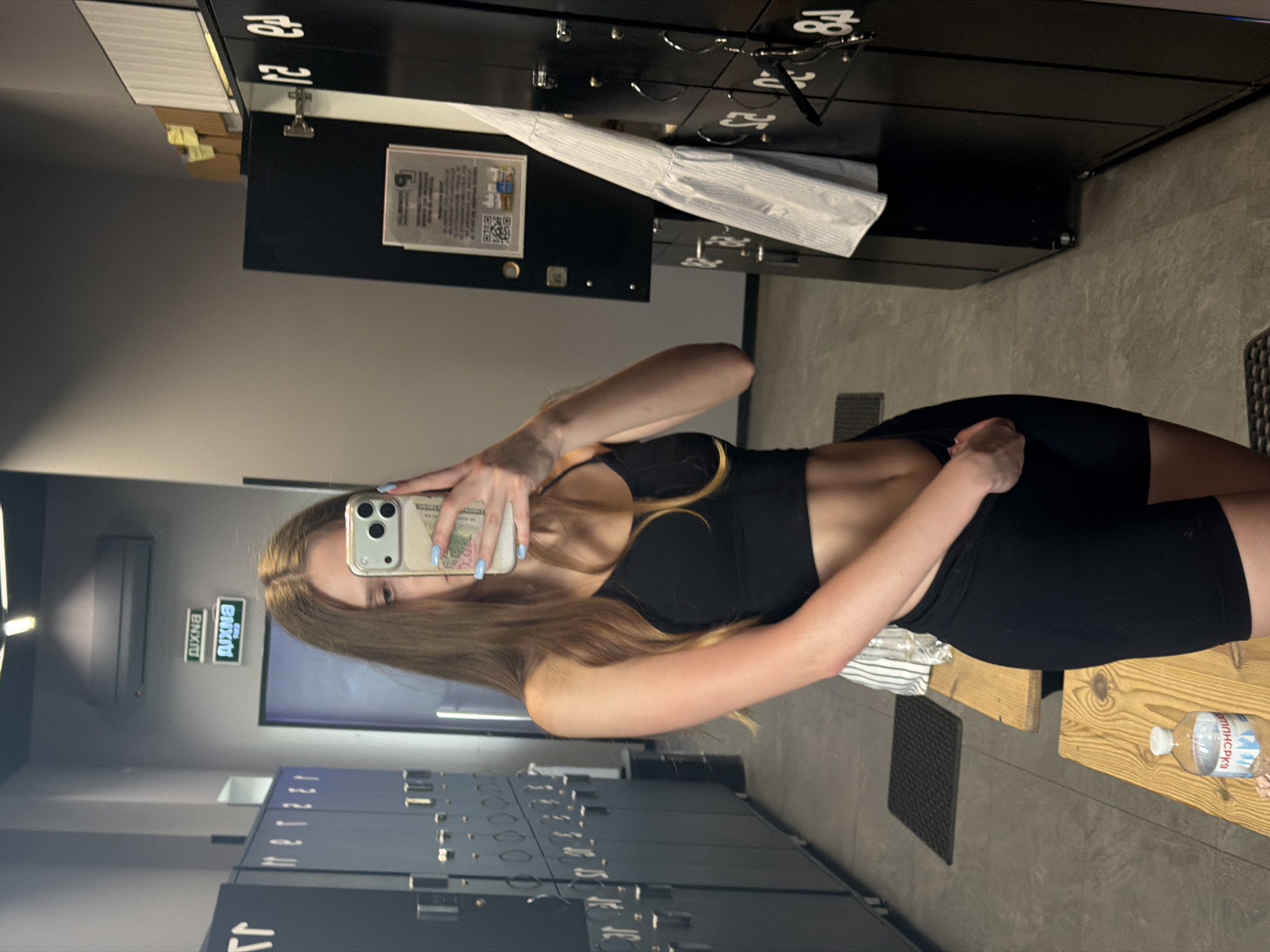 Gym session snapshots: locker room selfies and a weightlifting belt