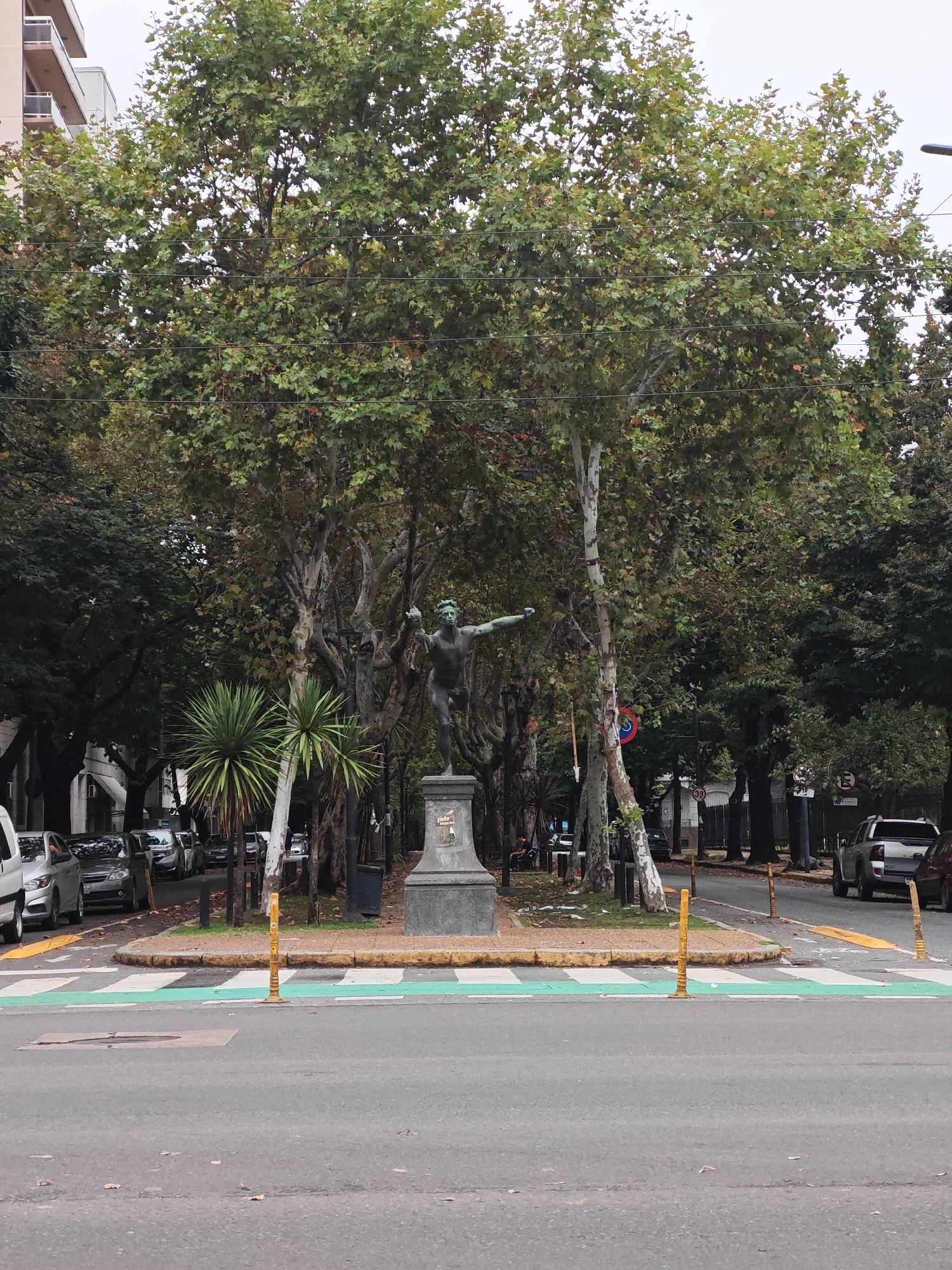 Nude male statue stands prominently in La Plata traffic island