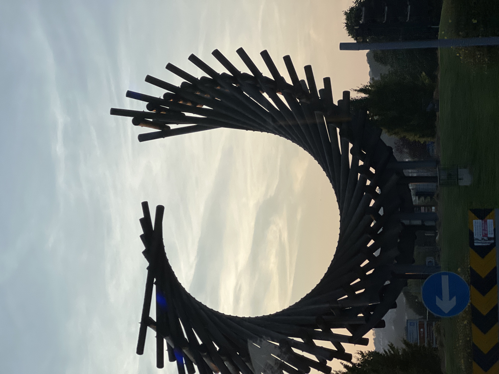 Outdoor sculptures and a hazy sunset in Letterkenny, Ireland