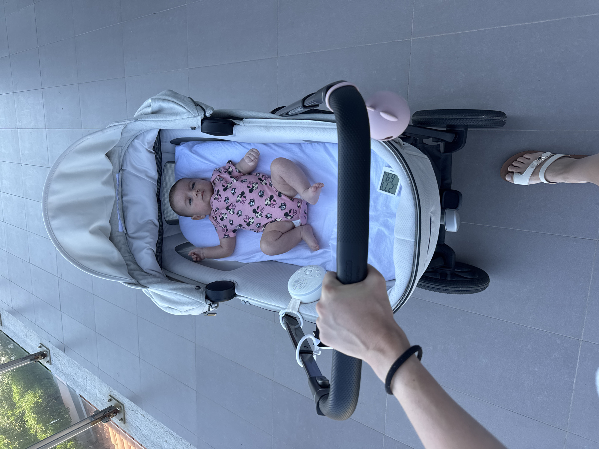 Morning by the sea in Capaci with coastal views and a stroller.