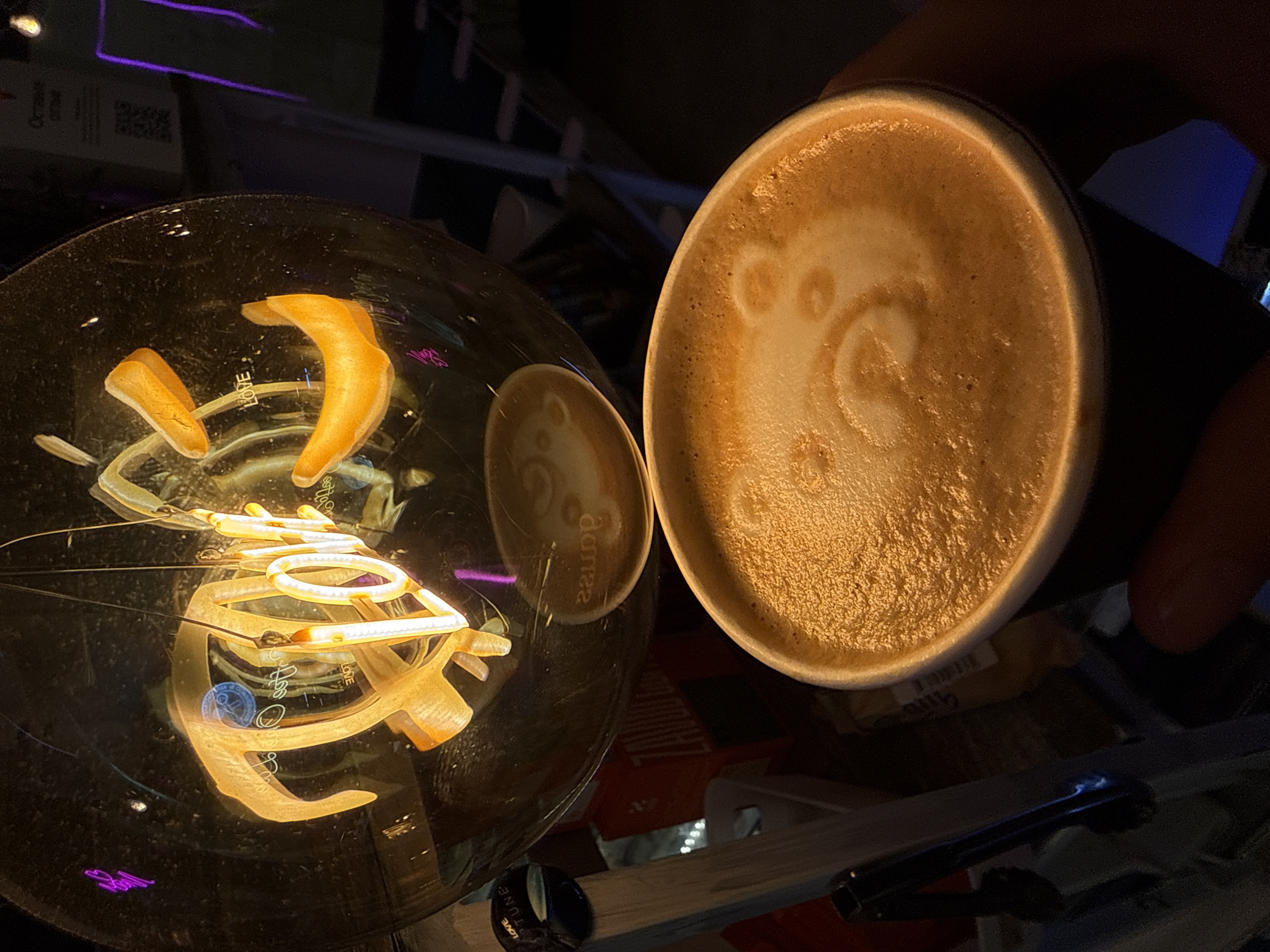Latte art and oranges at a Moscow café