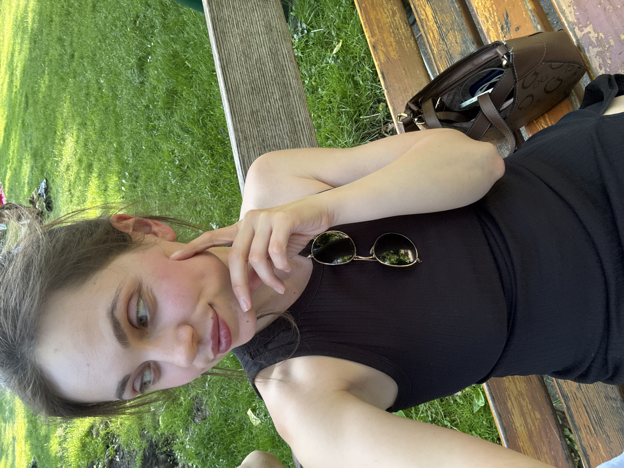 Woman enjoys sunny afternoon in Vienna's Stadtpark