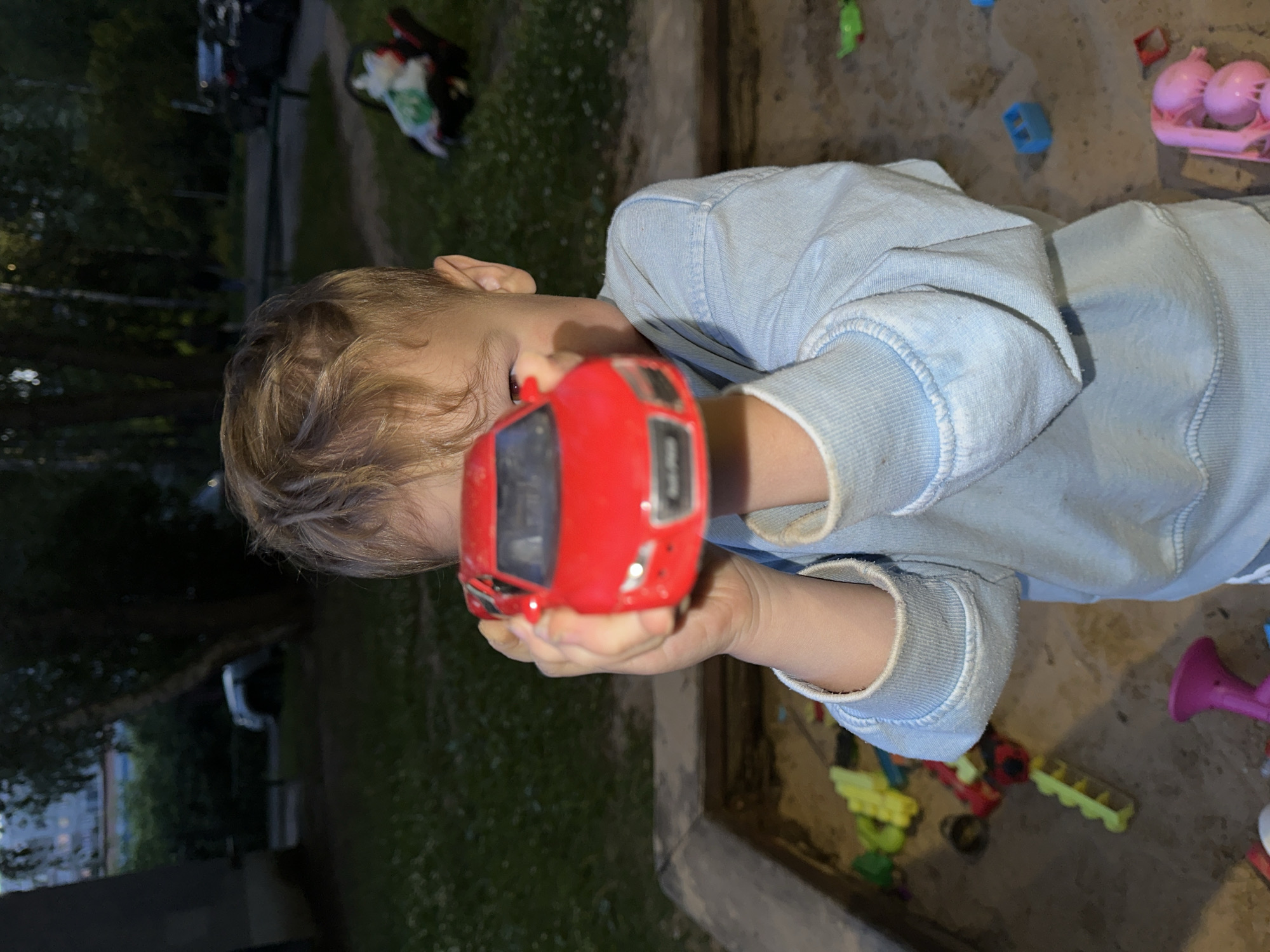 Sandbox playtime in a Nizhny Novgorod courtyard at dusk