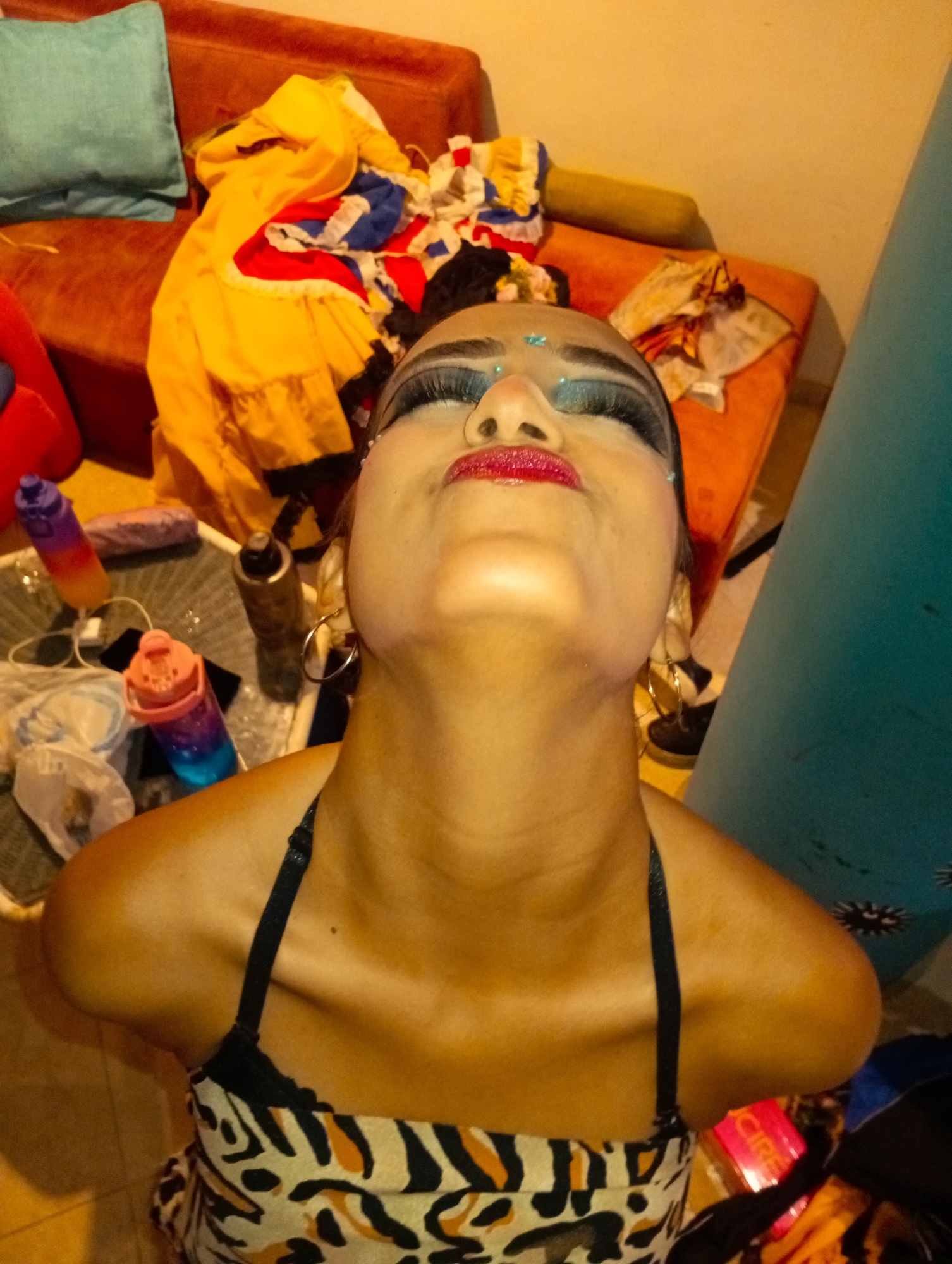 Costume preparation and celebration documented at Playa El Agua