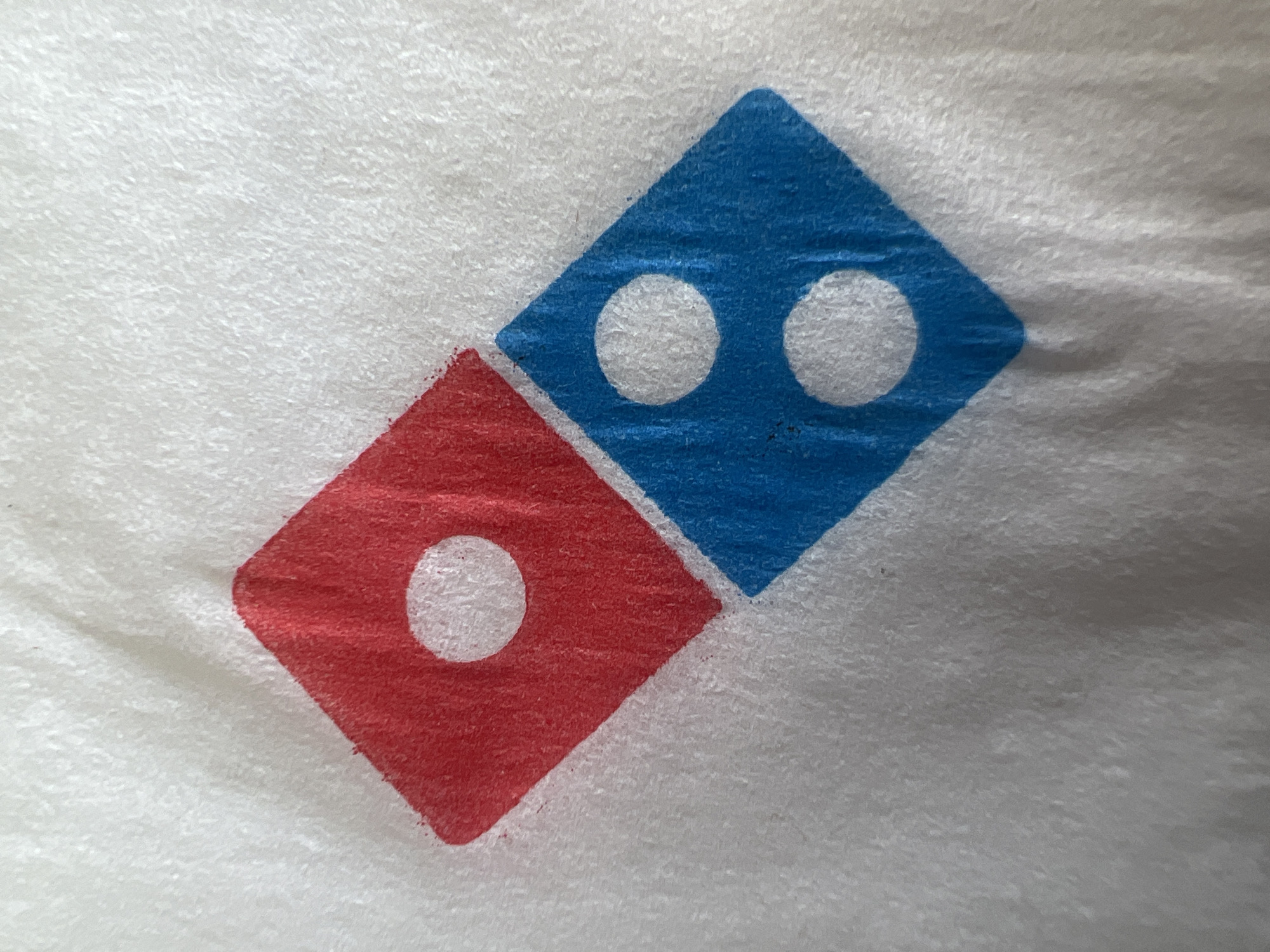 Domino's Pizza branding spotted on the ground in Odesa