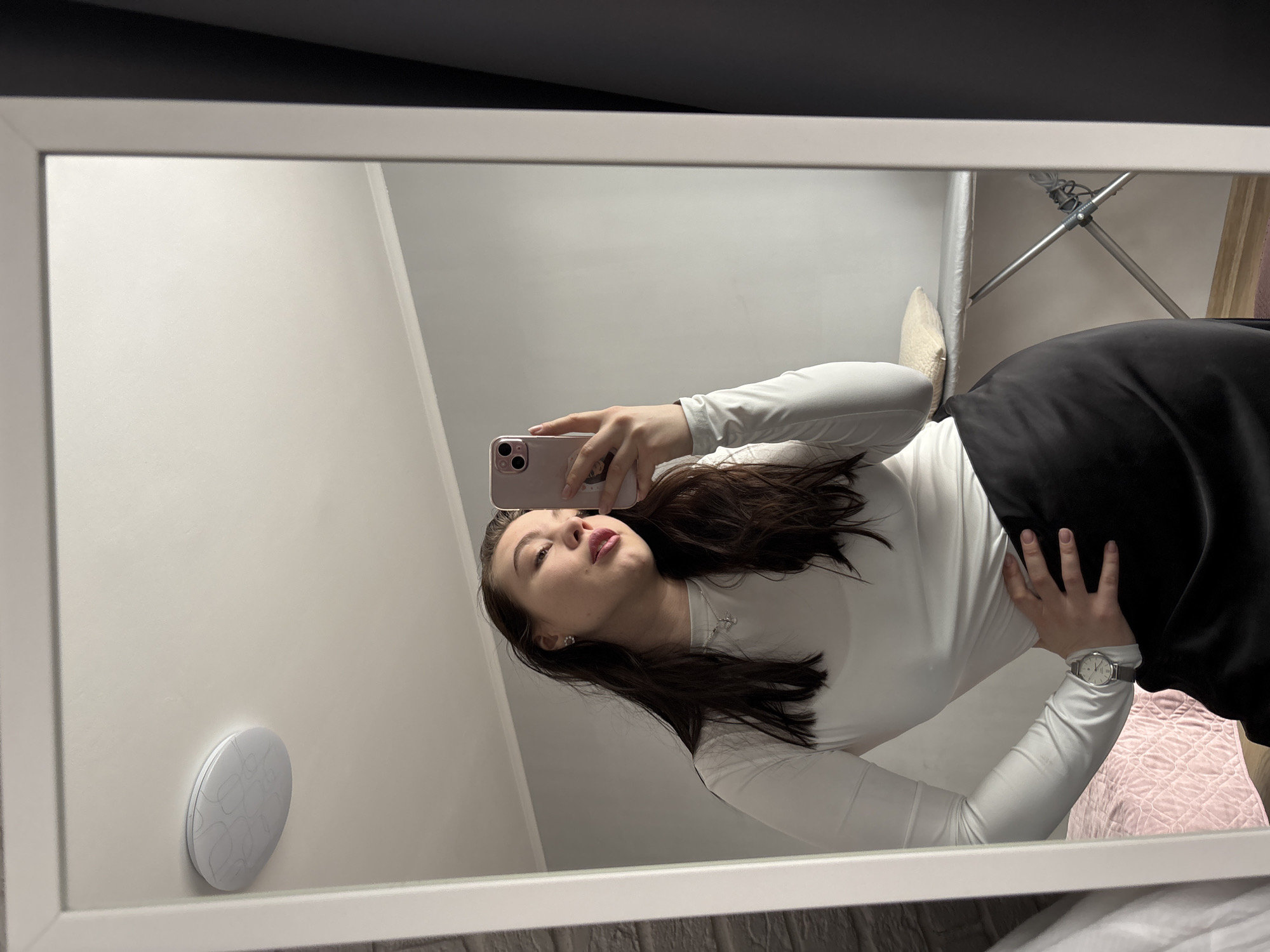 Woman documents quiet morning moments with selfies and pet