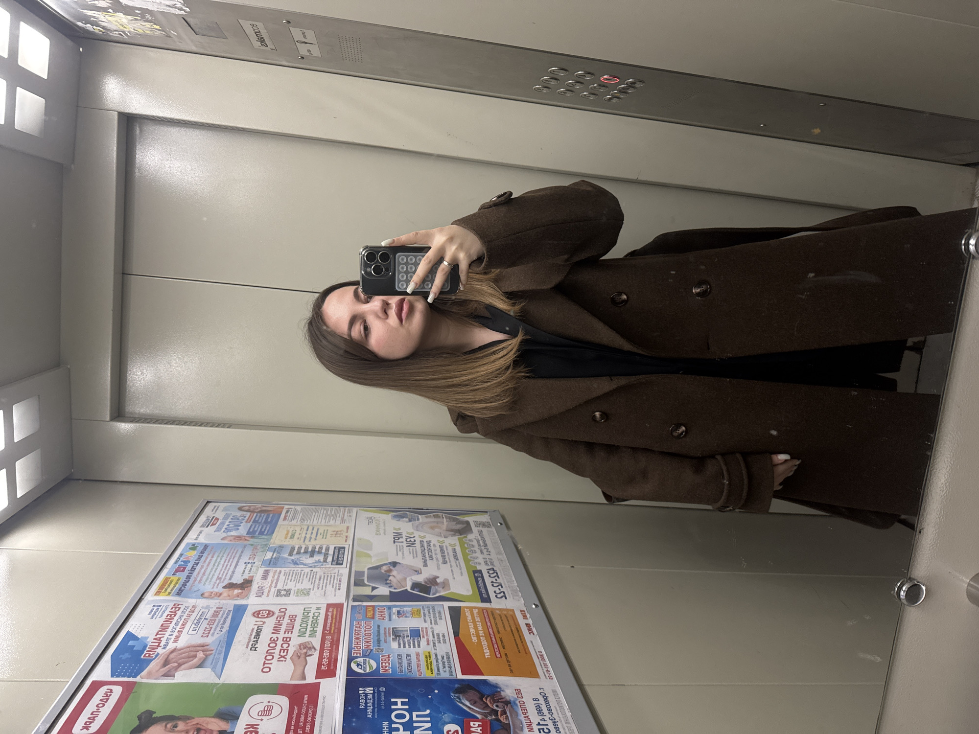 Woman takes morning elevator selfie in Orekhovo-Zuyevo