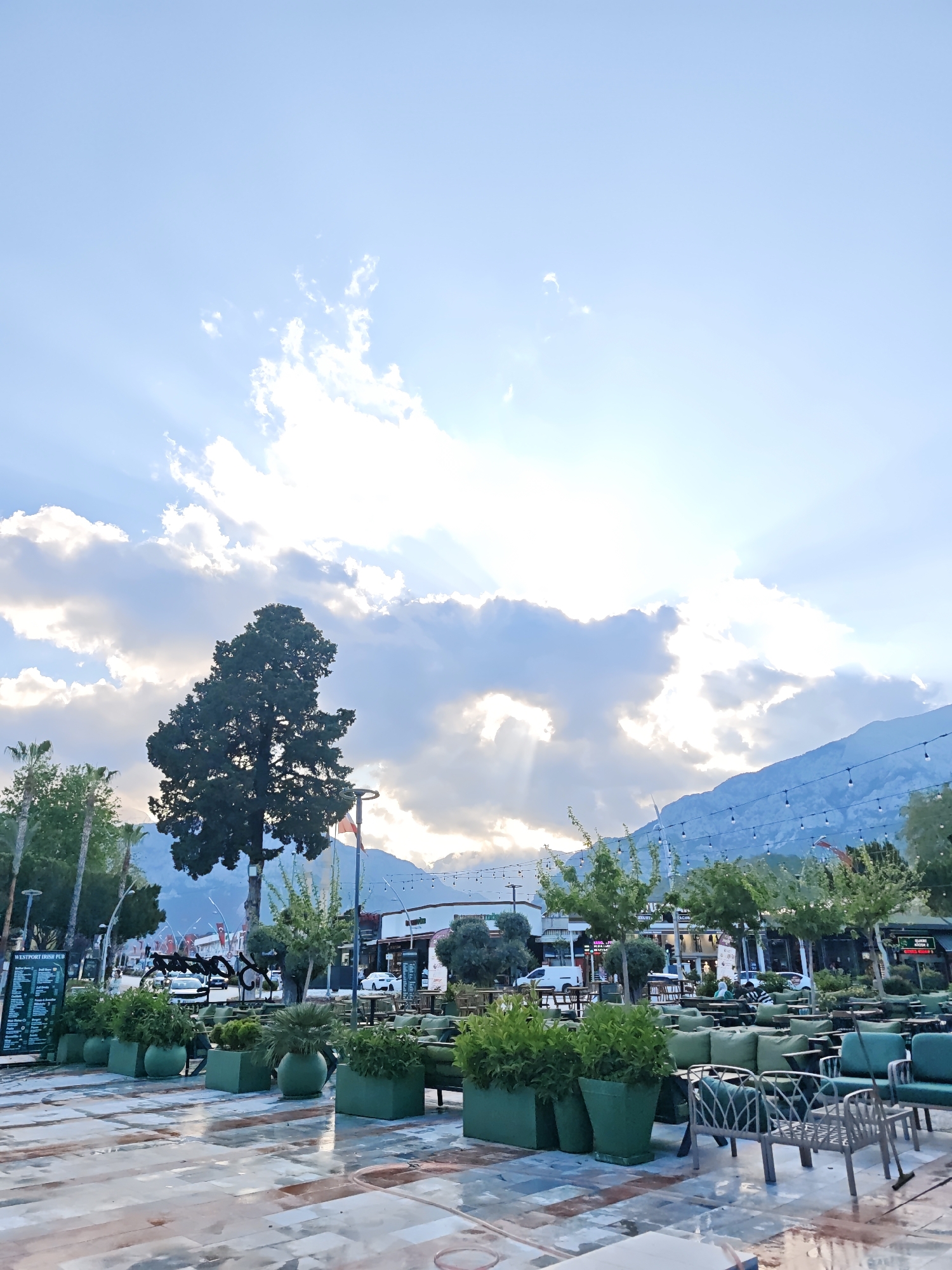 Spring visitors explore Kemer park amid blooming wisteria, camel statues