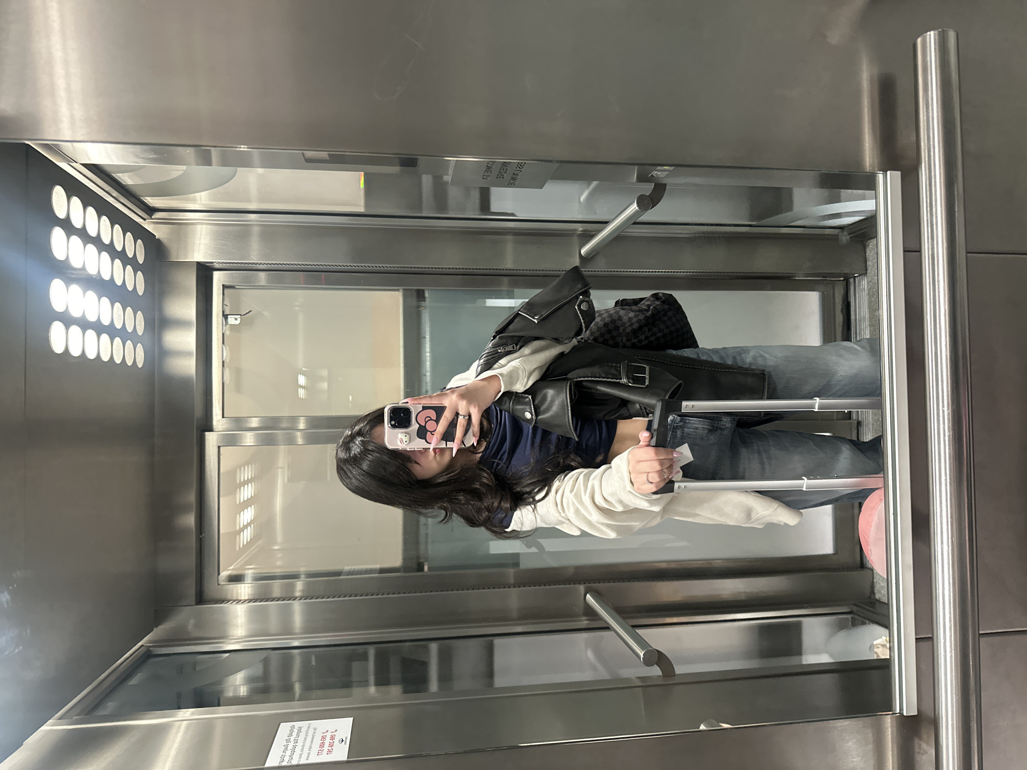 Woman takes elevator selfie in Yerevan