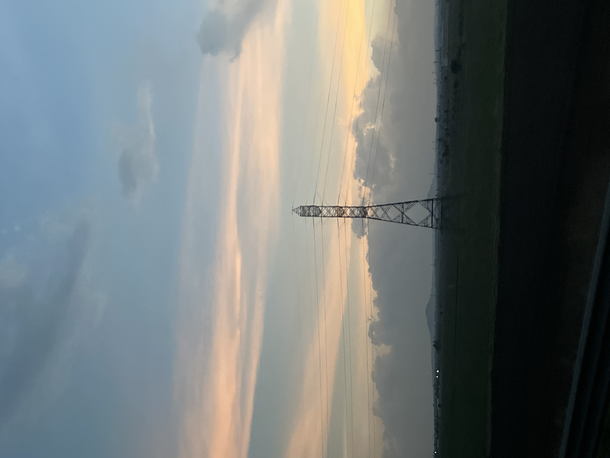 Transmission tower observed in agricultural field near Calpulalpan, Mexico