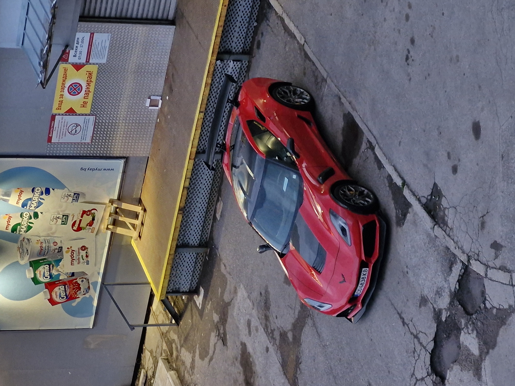 Red Corvette spotted in Sofia parking area during evening hours