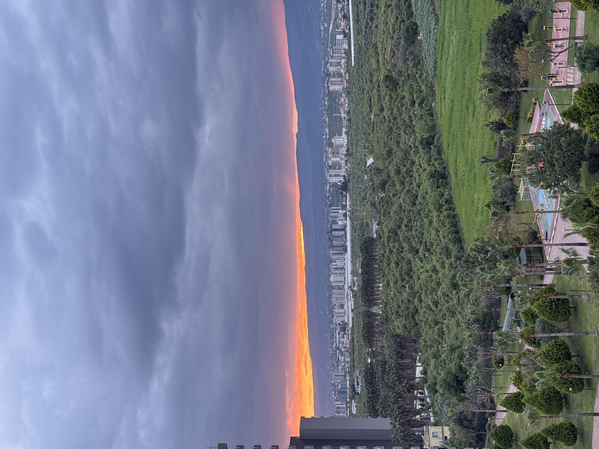 Vivid sunset captured over Erdemli coastline from elevated view