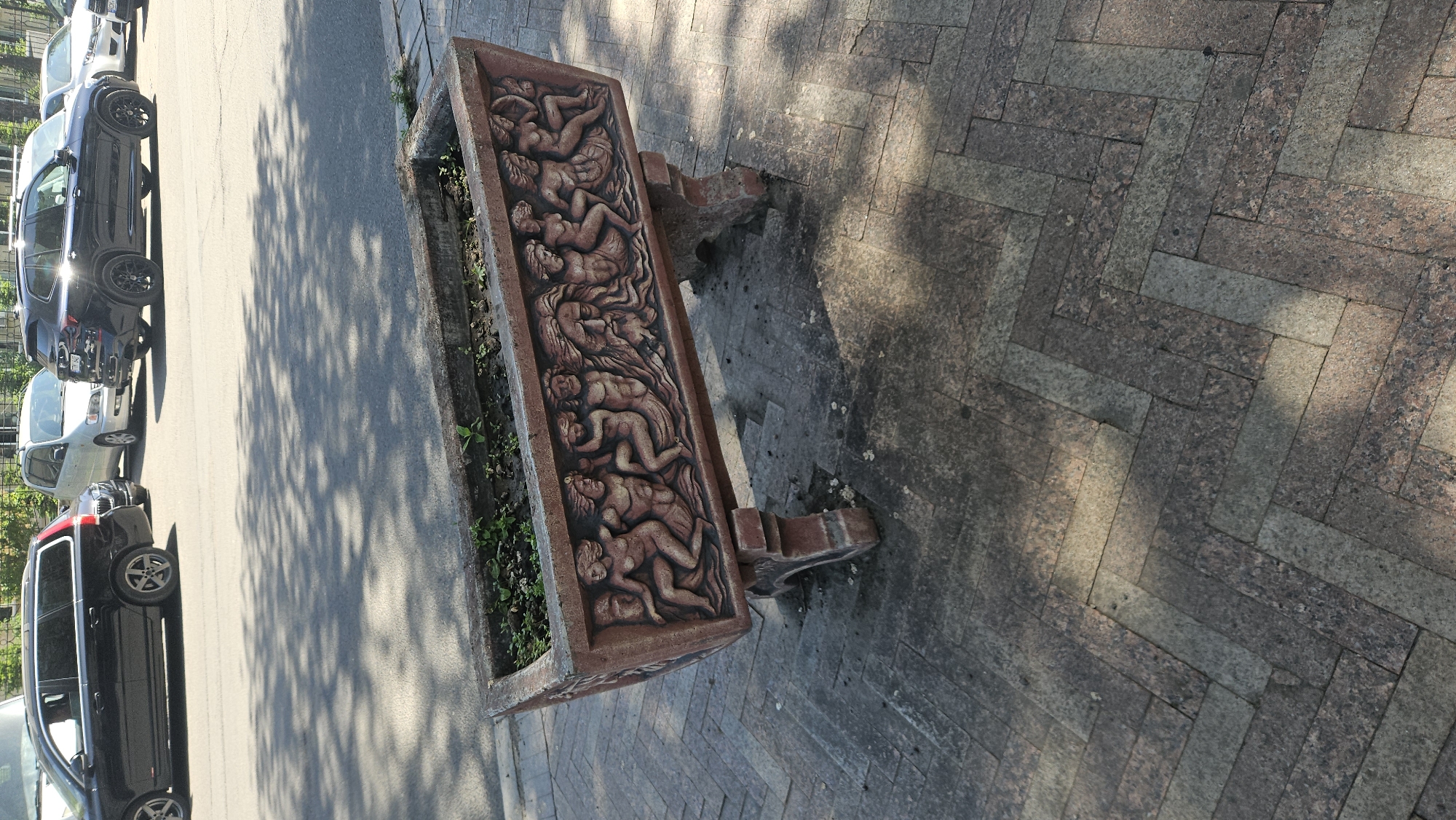 Ornate carved planter photographed on Chișinău street