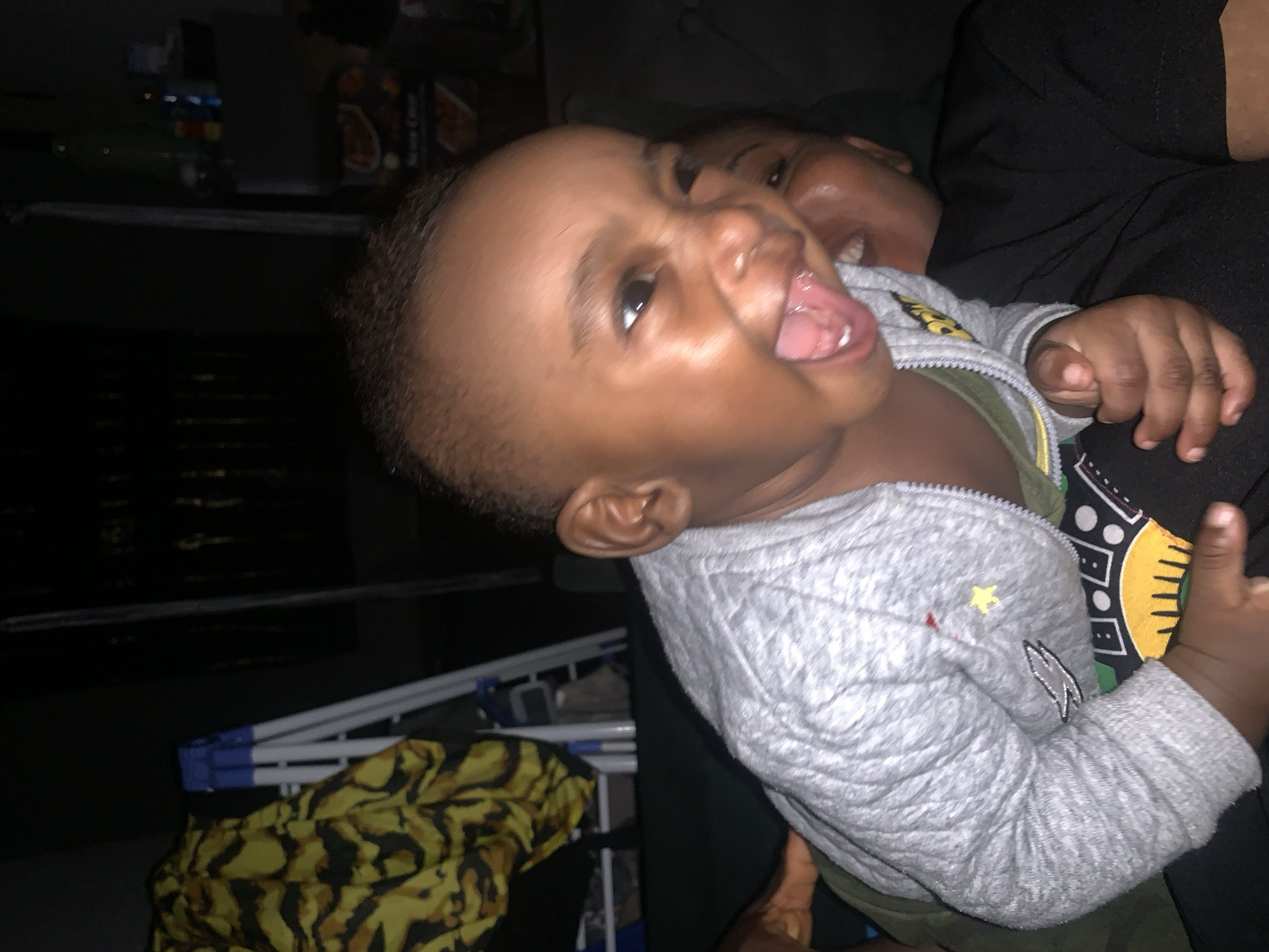 Playful candid moments with a child at home in Nigeria