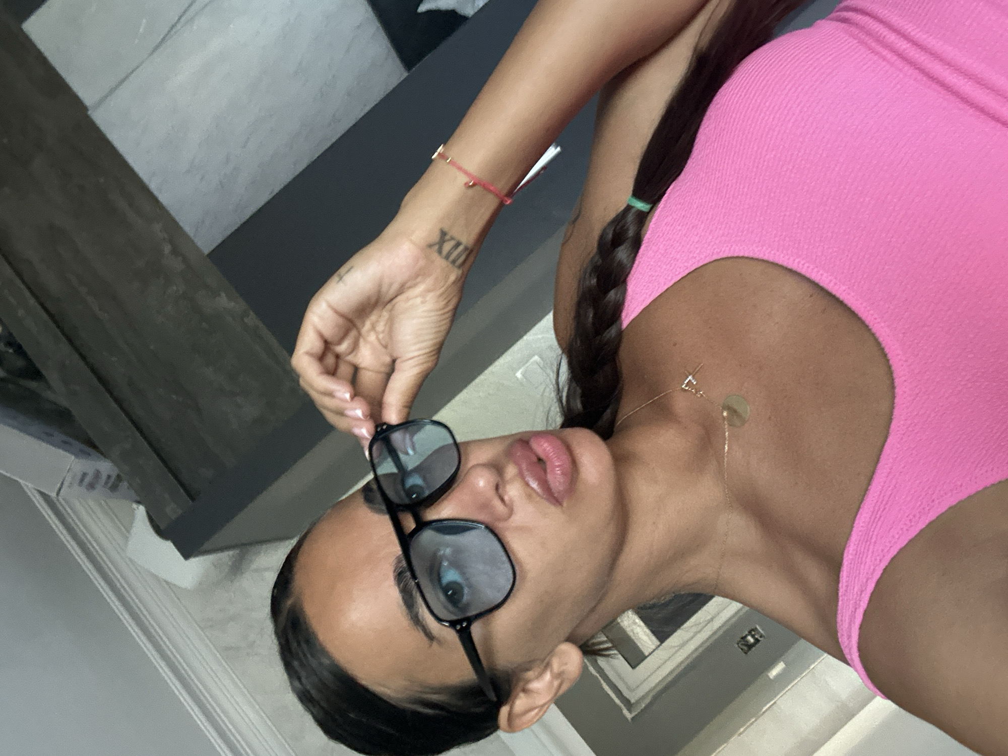 Selfie moment in Pernik, bold glasses and pink tank top