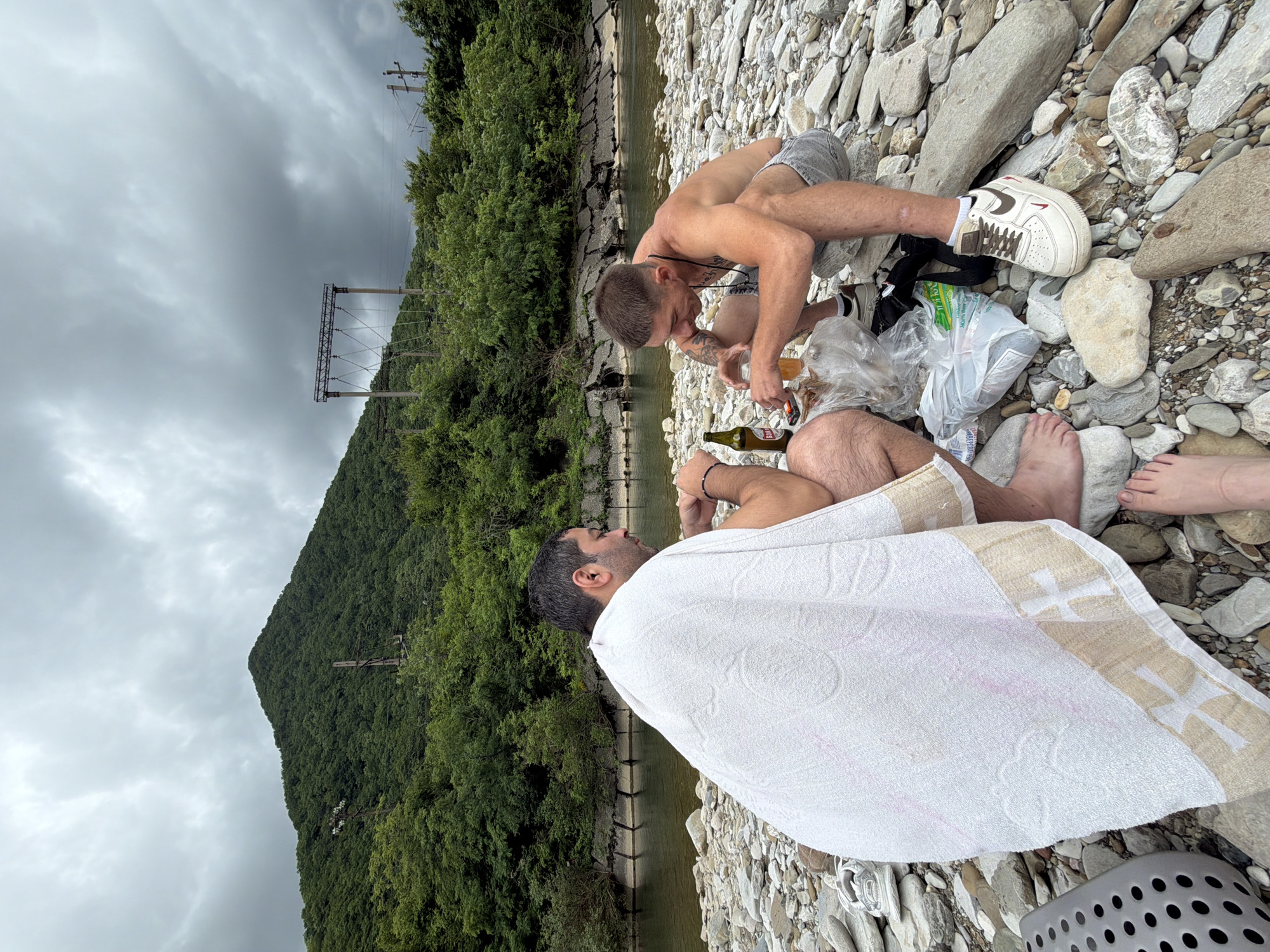 Riverside stop on a rocky Krasnoye riverbed under overcast skies