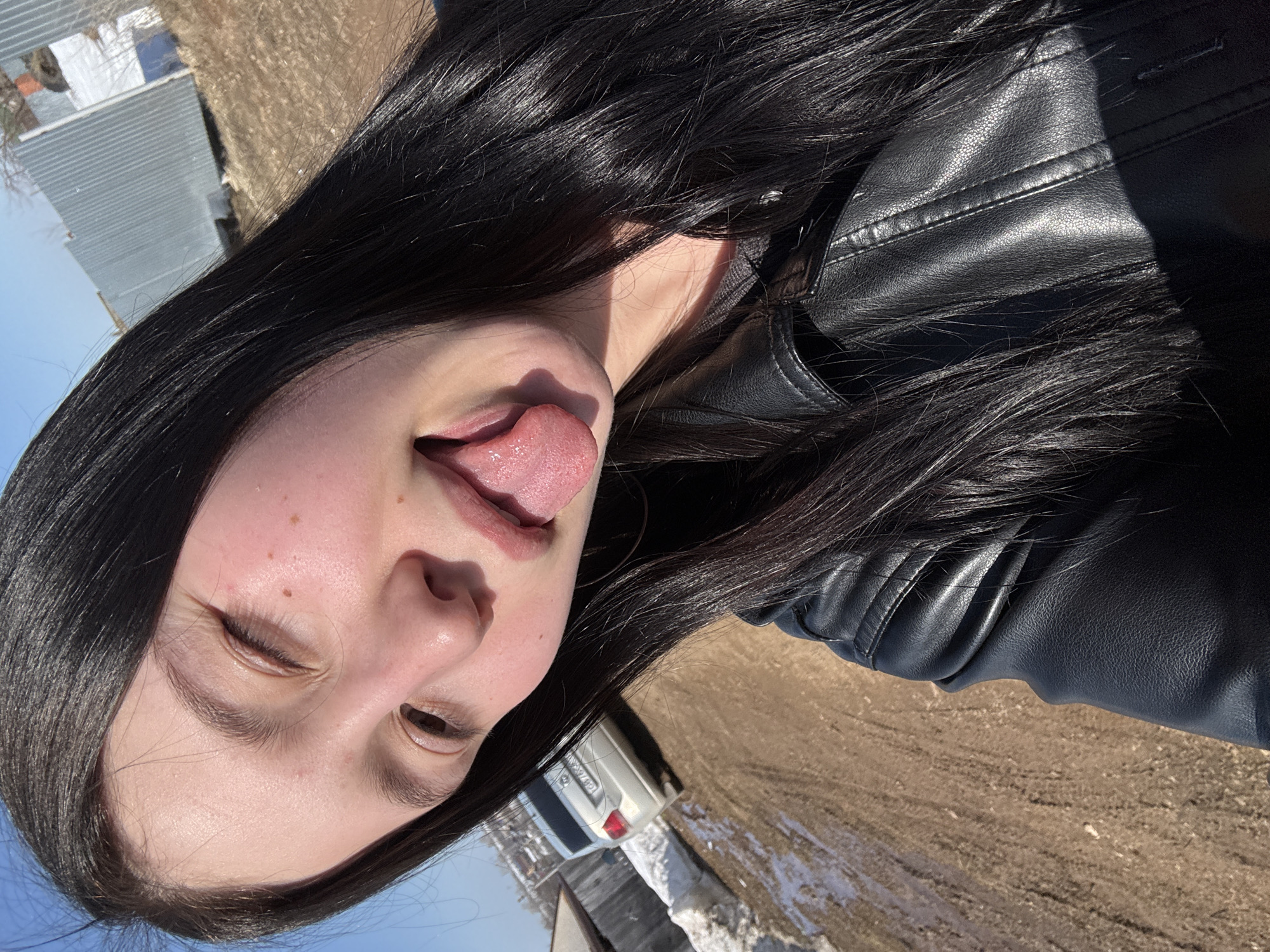 Woman poses playfully for photo in Foki, Russia
