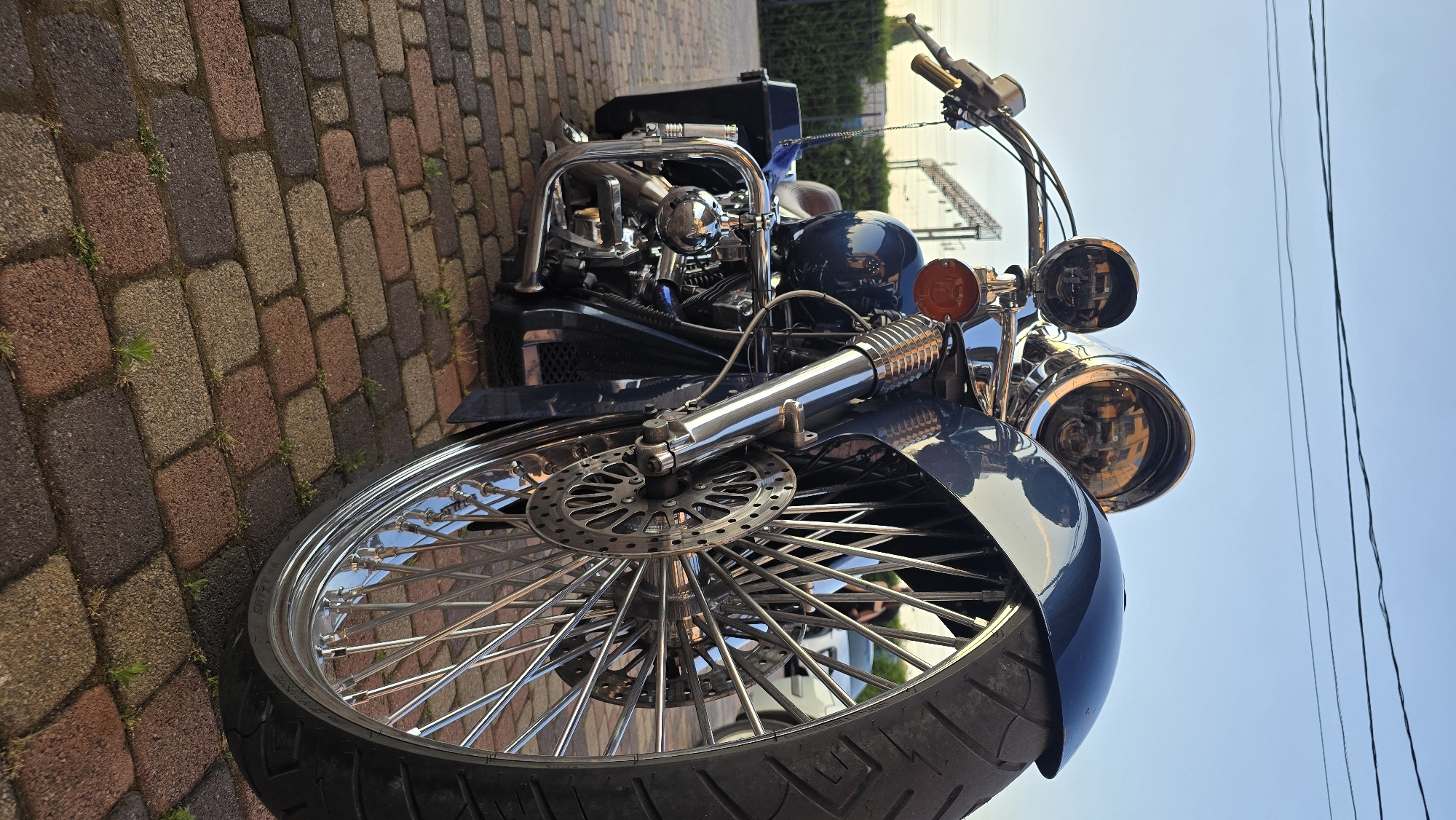 Custom motorcycles parked outside a Krasnodar venue during an indoor gathering
