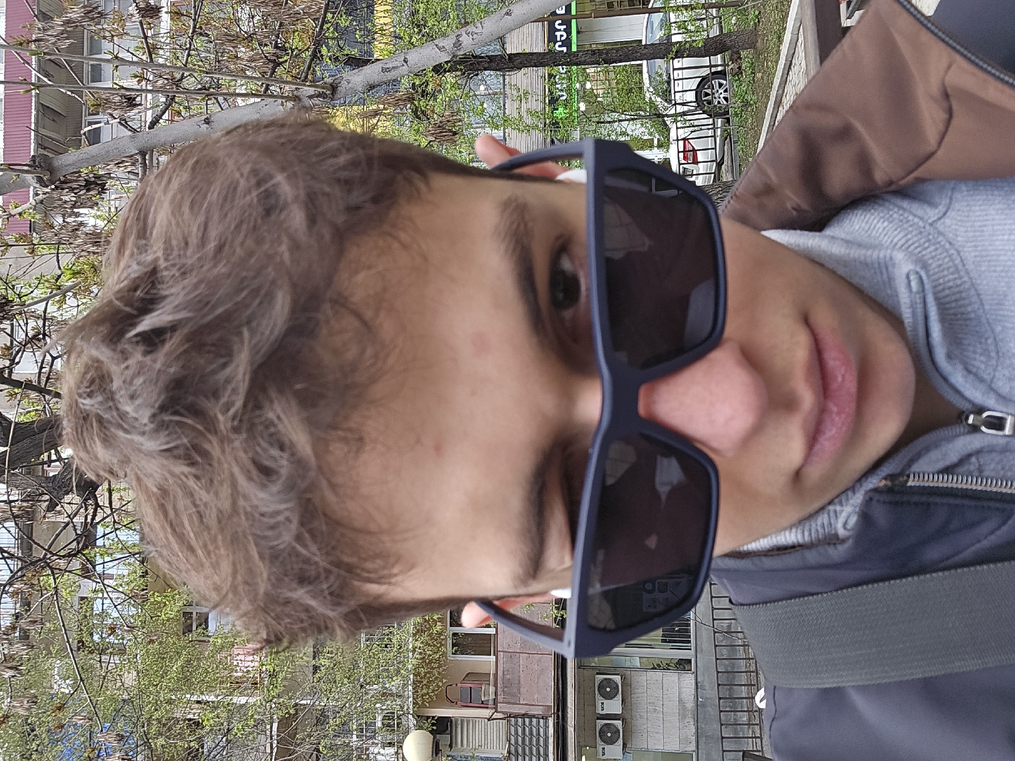 Young man in sunglasses photographed in Yerevan