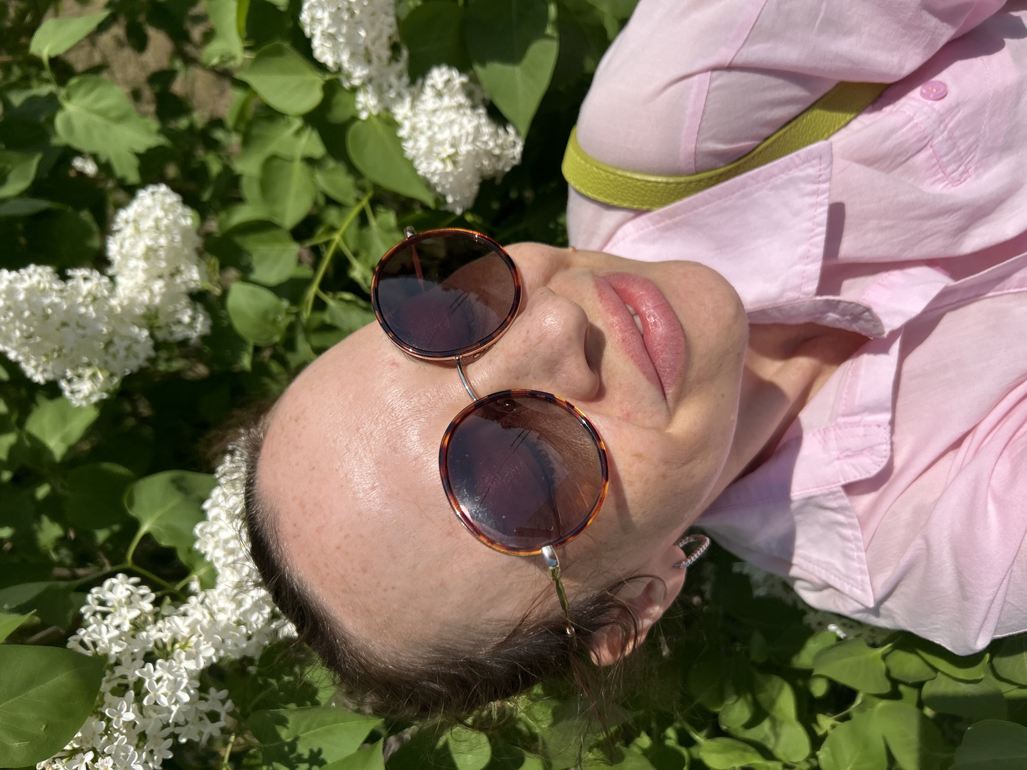 Spring lilac blooms and casual moments captured in Chaikovsky, Russia