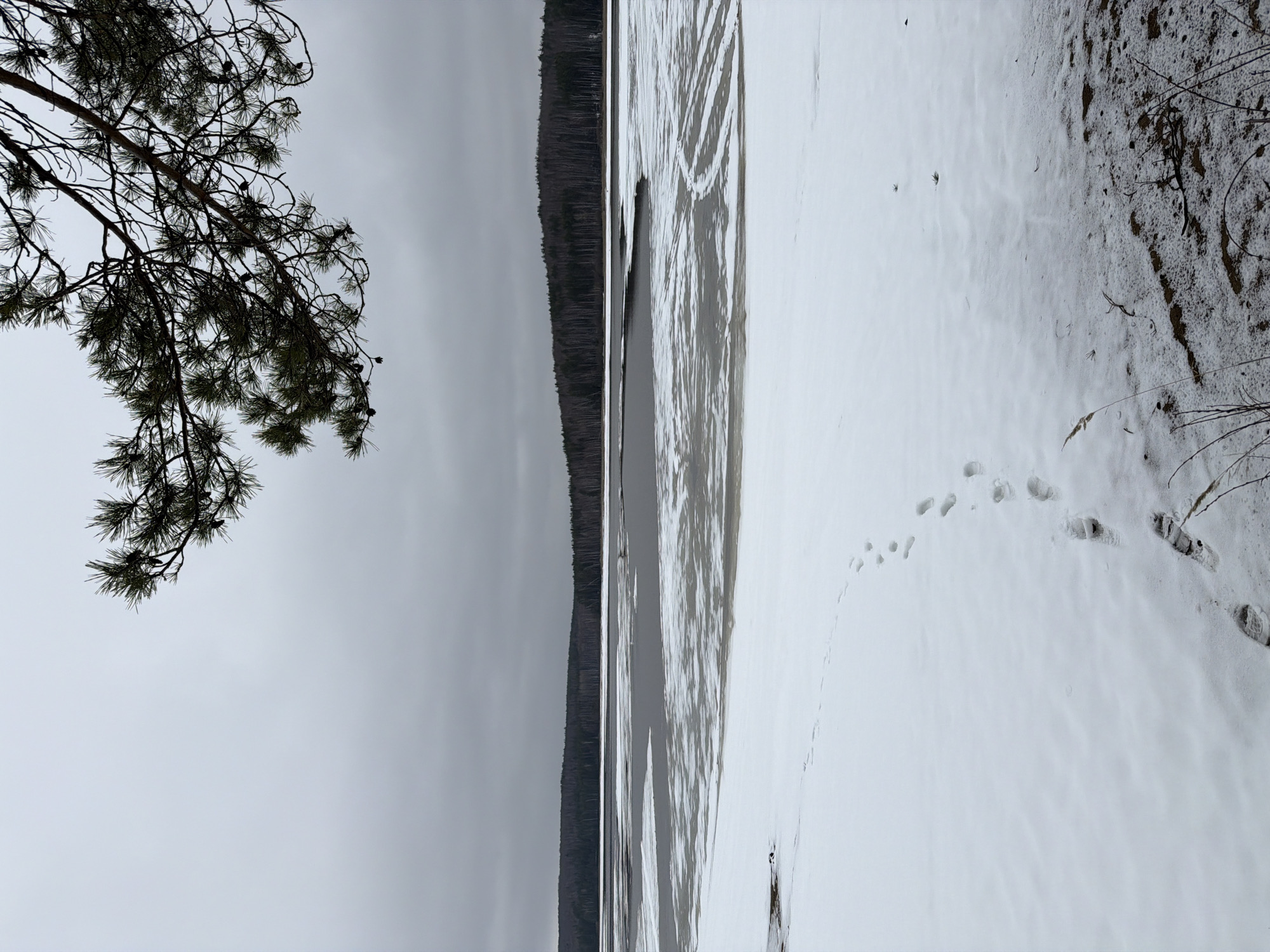 People walk across frozen Kama Reservoir in Chaykovsky, Russia