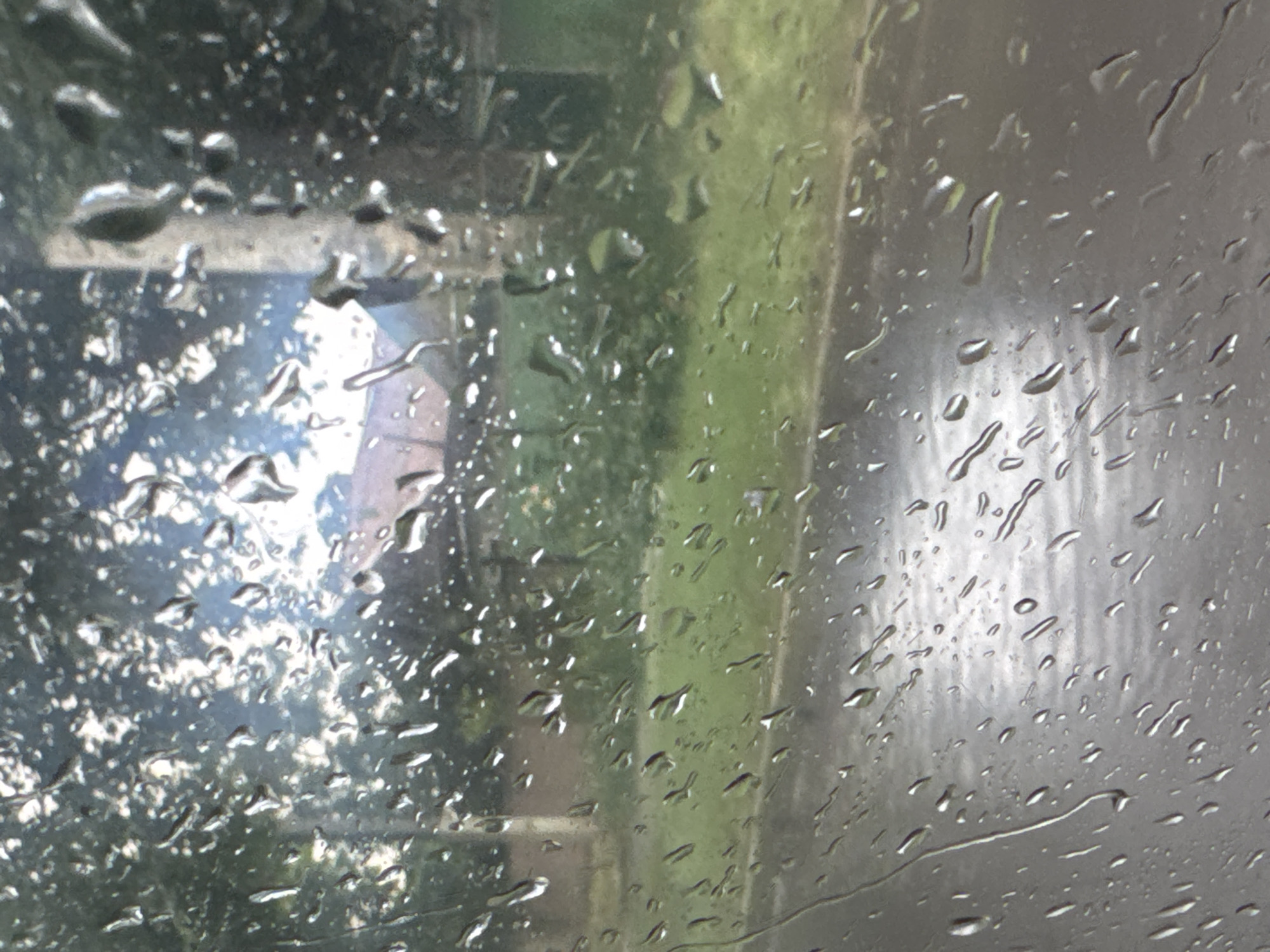 Rainy day in Tiraspol, seen through a wet car window