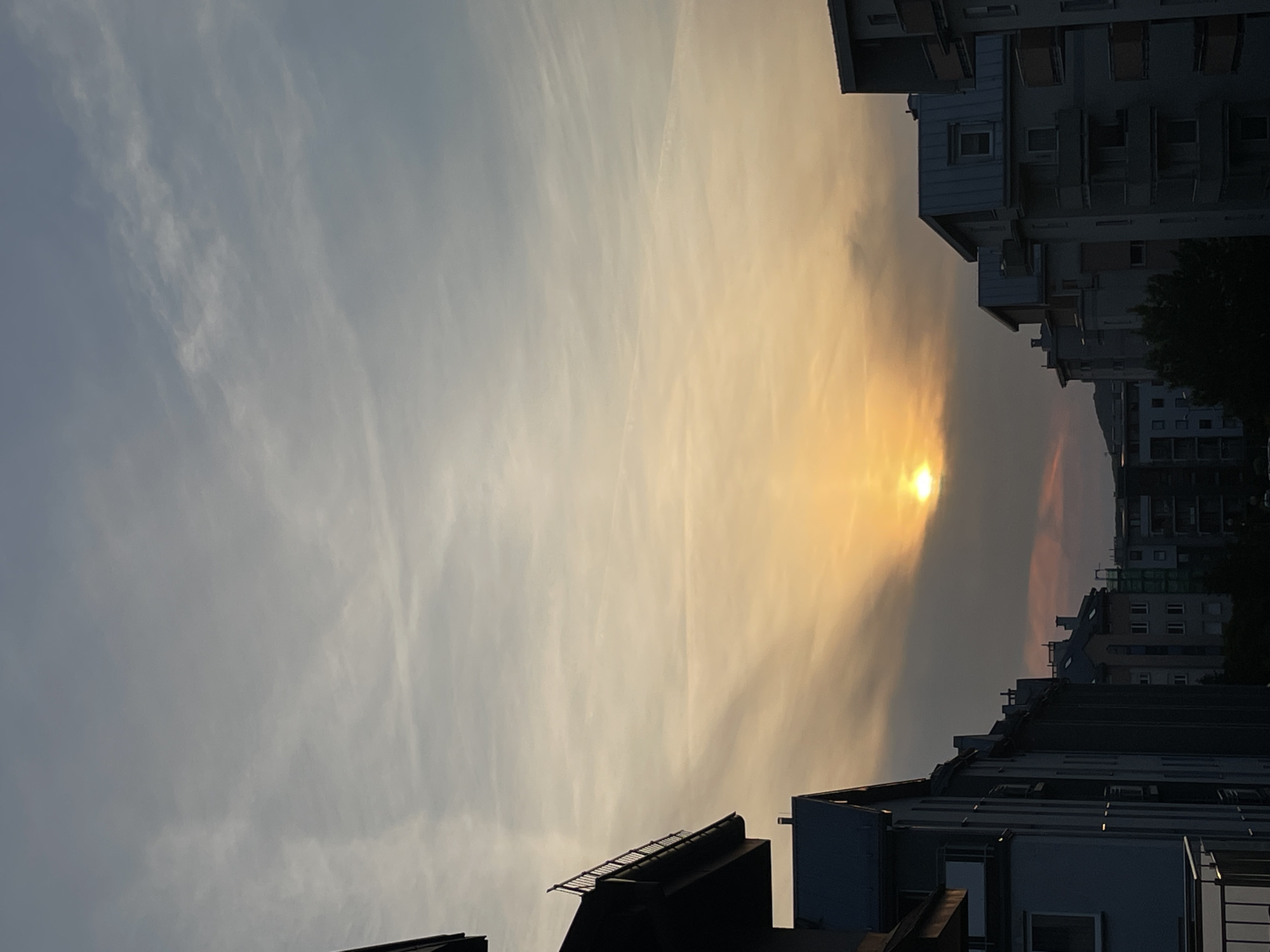 Witness documents dramatic urban sunset with golden skies