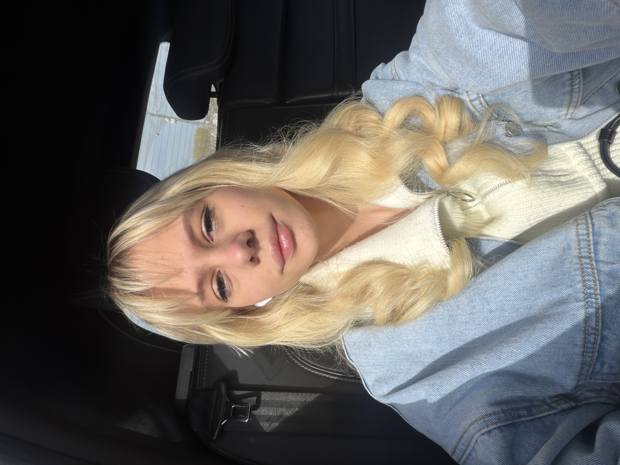 Person in denim jacket observed in vehicle, Moscow