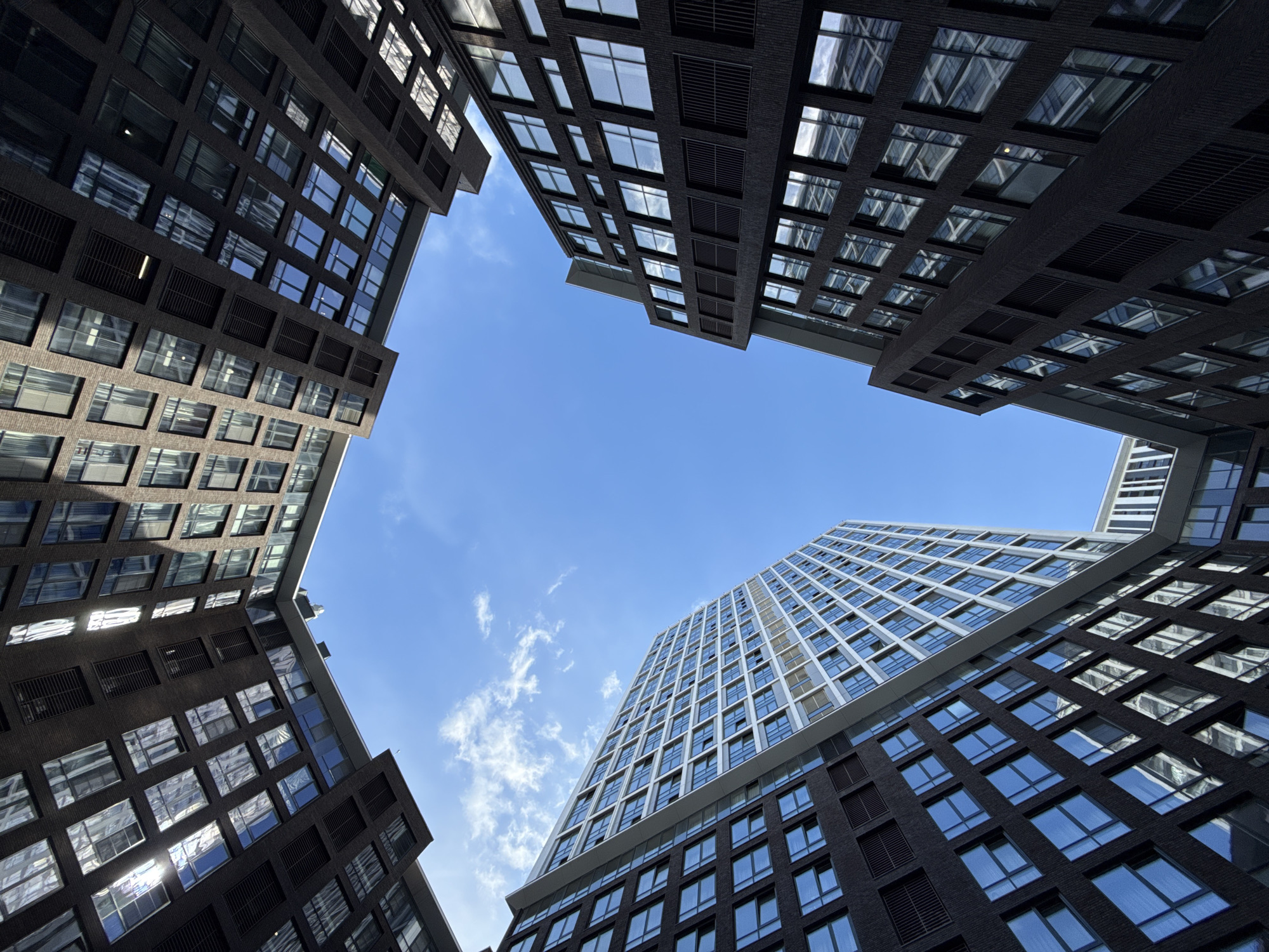 Moscow witness photographs tall buildings from ground perspective