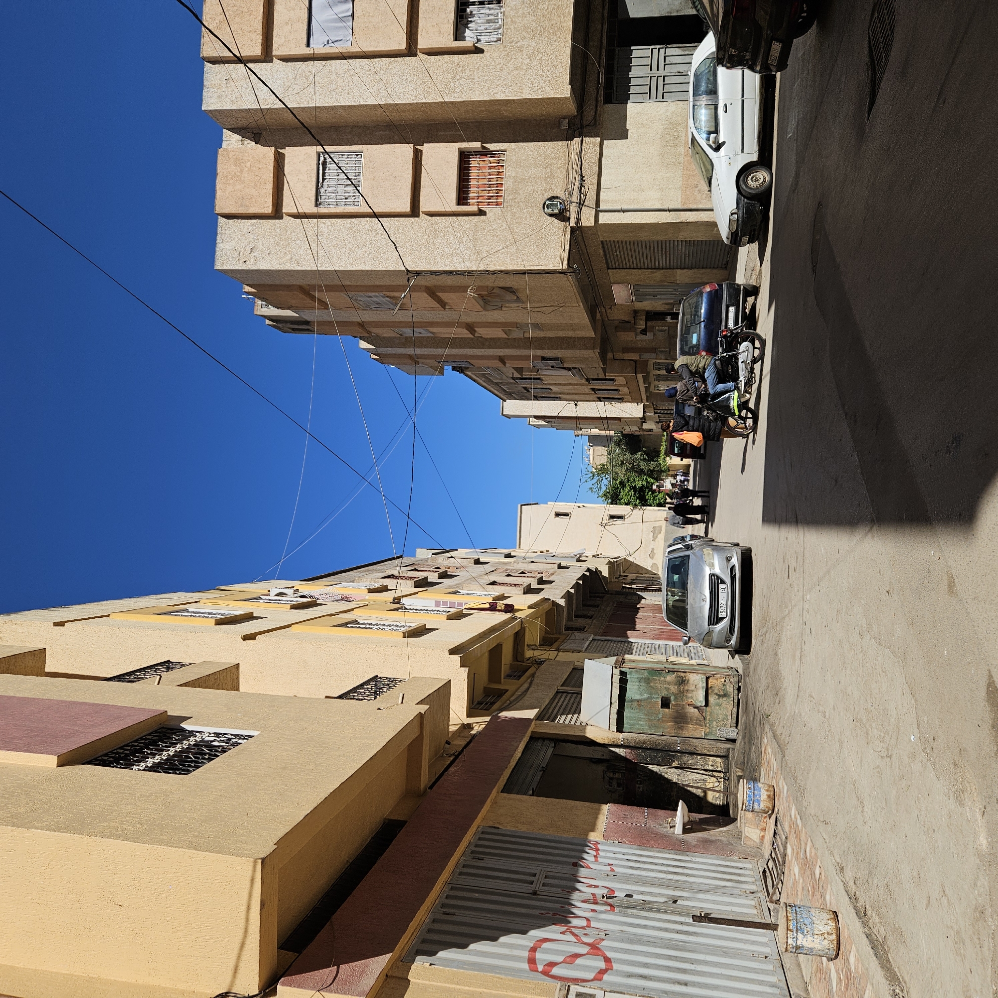 Person photographed on narrow street in Fez, Morocco