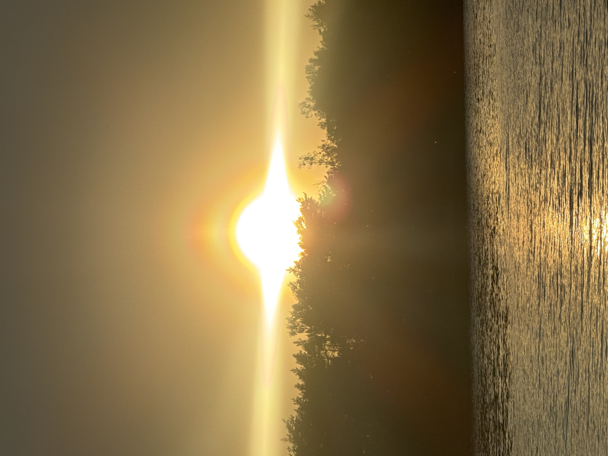 Sunset captured over lake in rural Belarus village