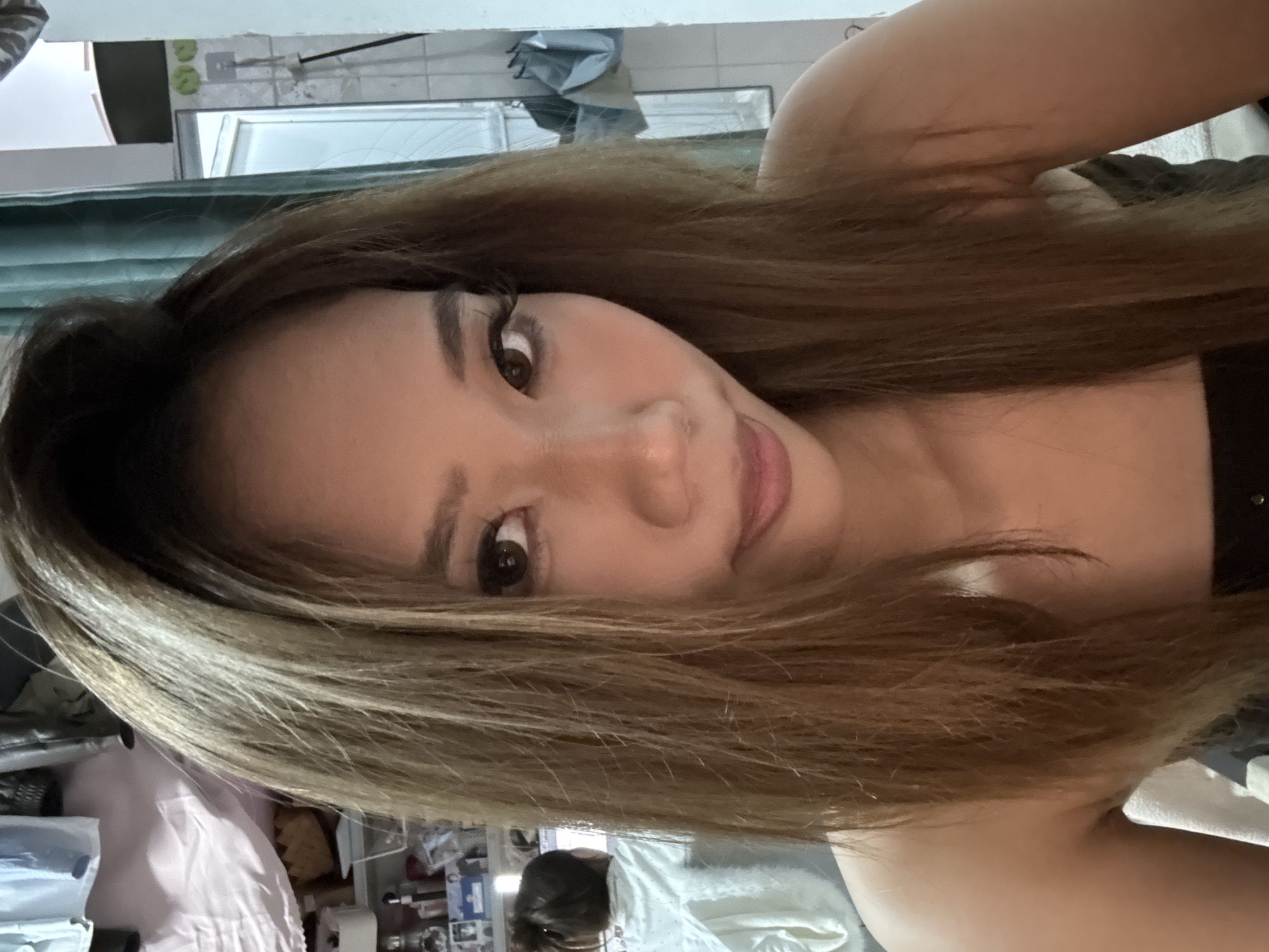 Woman takes selfies indoors in Nan'an District, China