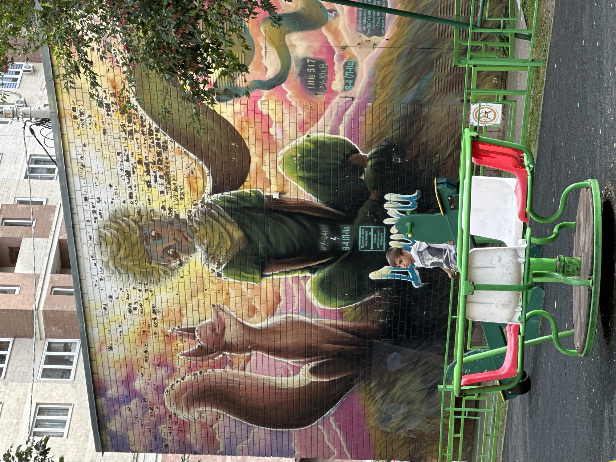 Podolsk courtyard: street murals, a playground, and neighborhood details