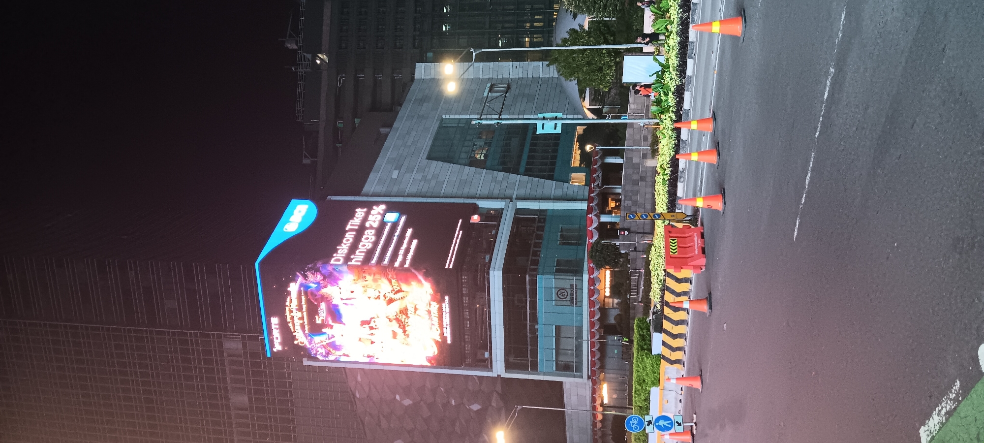 Central Jakarta's Bundaran HI district lit up on a Saturday night