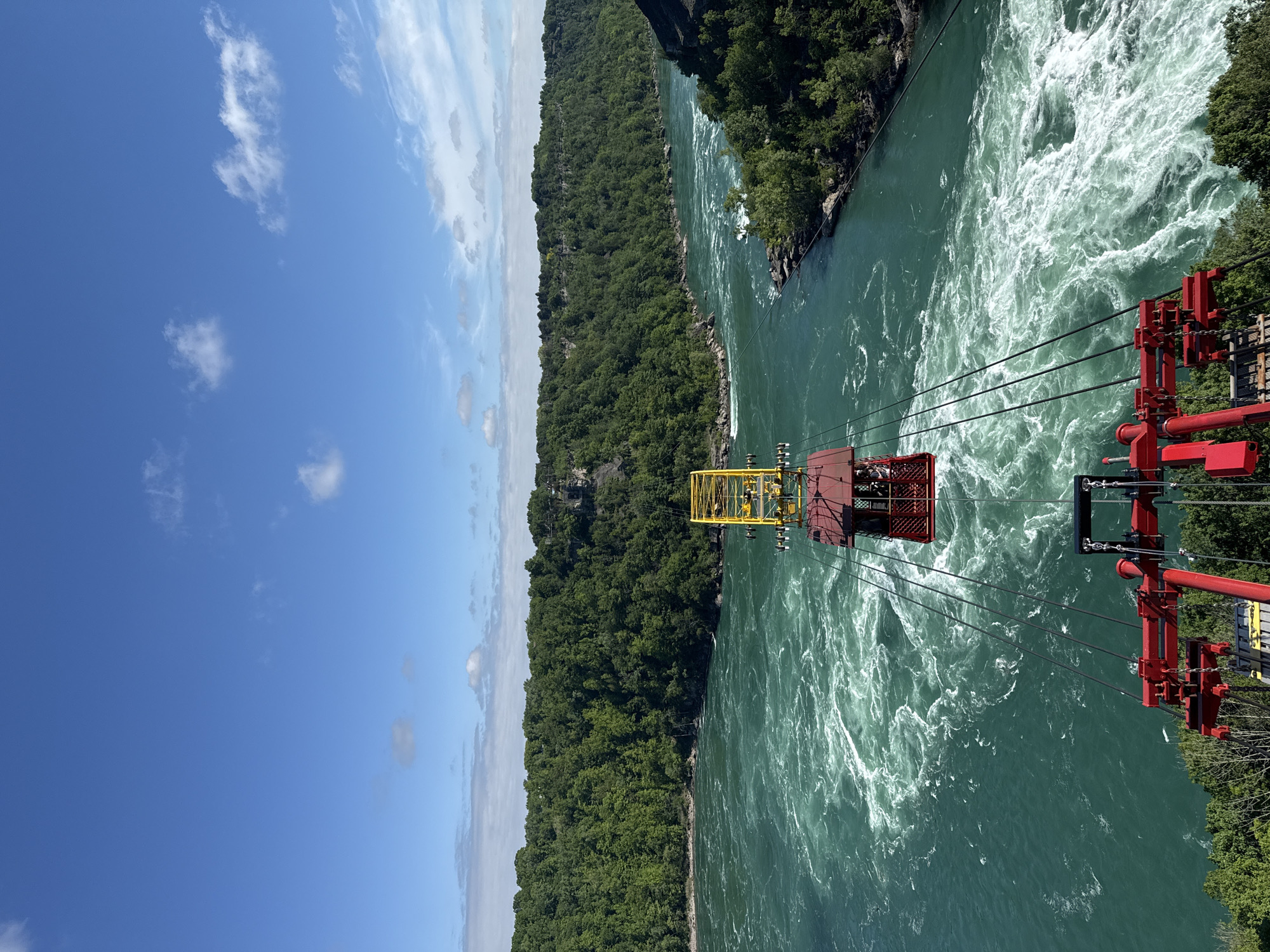 Aero Car operates over Niagara Whirlpool on sunny afternoon