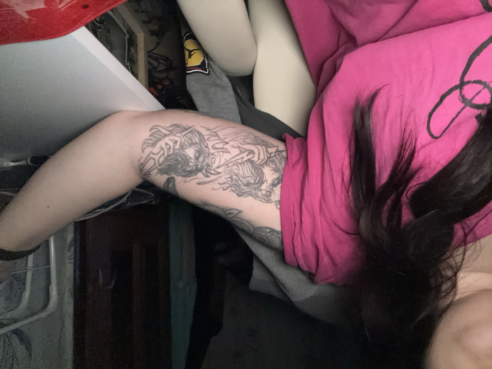 Person displays multiple tattoos including Arabic text in Bulgaria