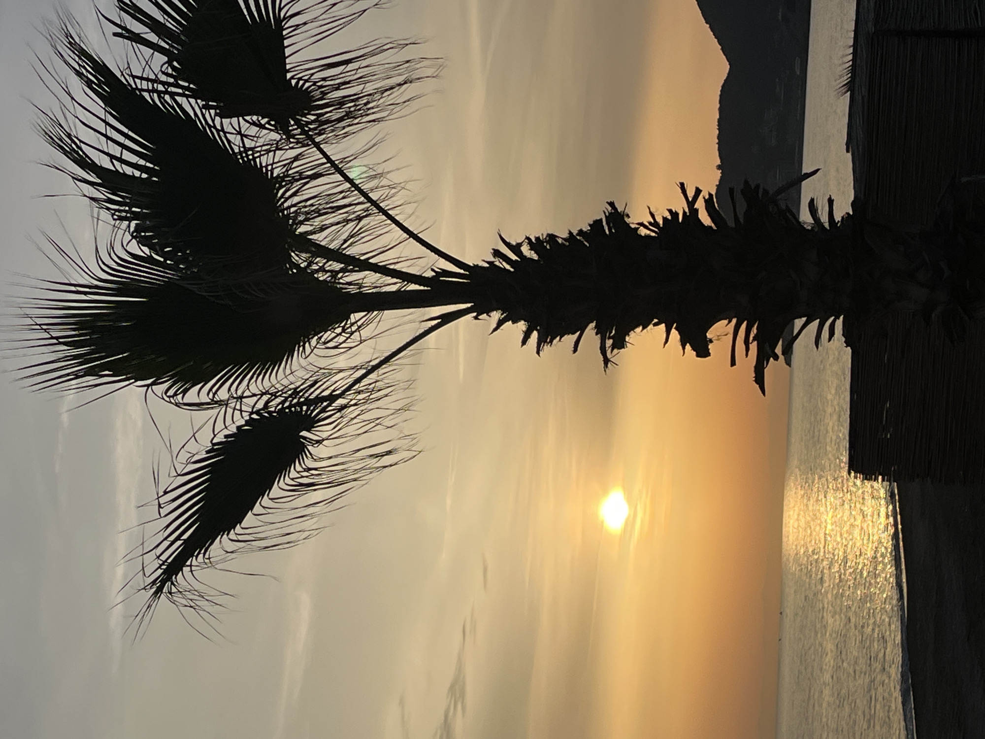 Alanya beachgoers enjoy sunset activities along Turkish Mediterranean coast