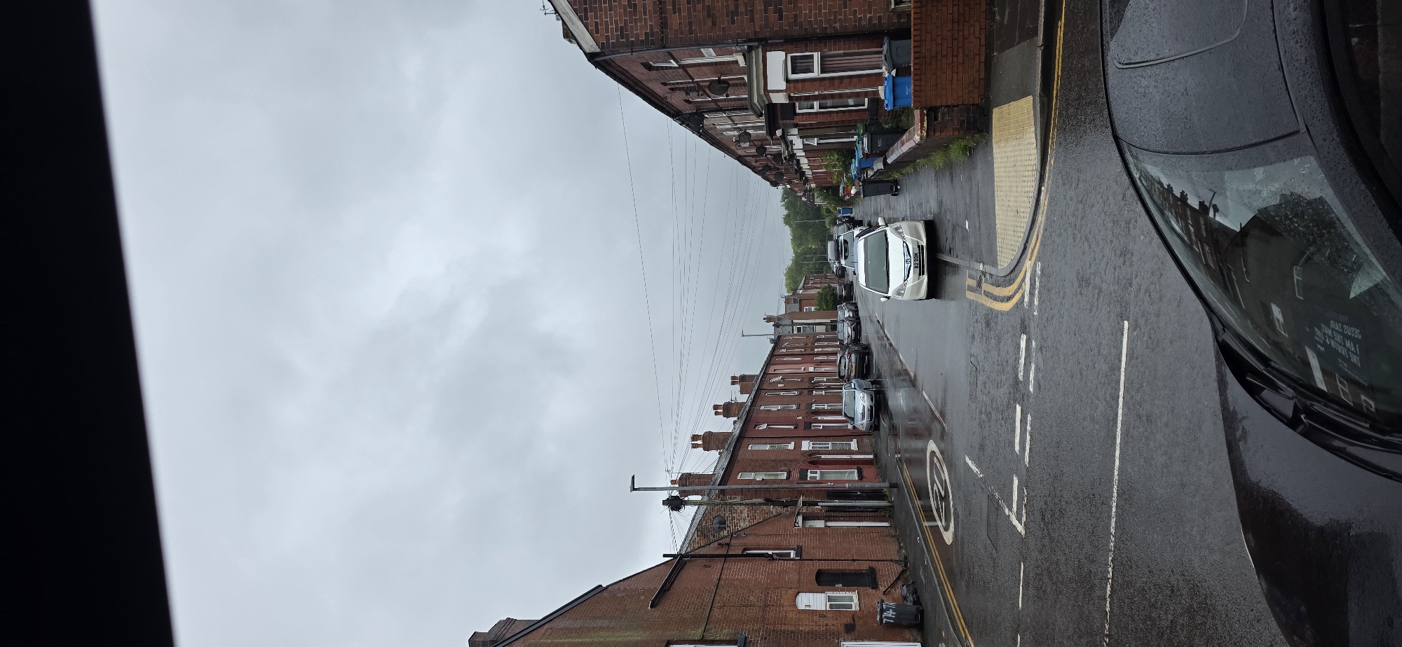 Overcast afternoon documented on Manchester residential street