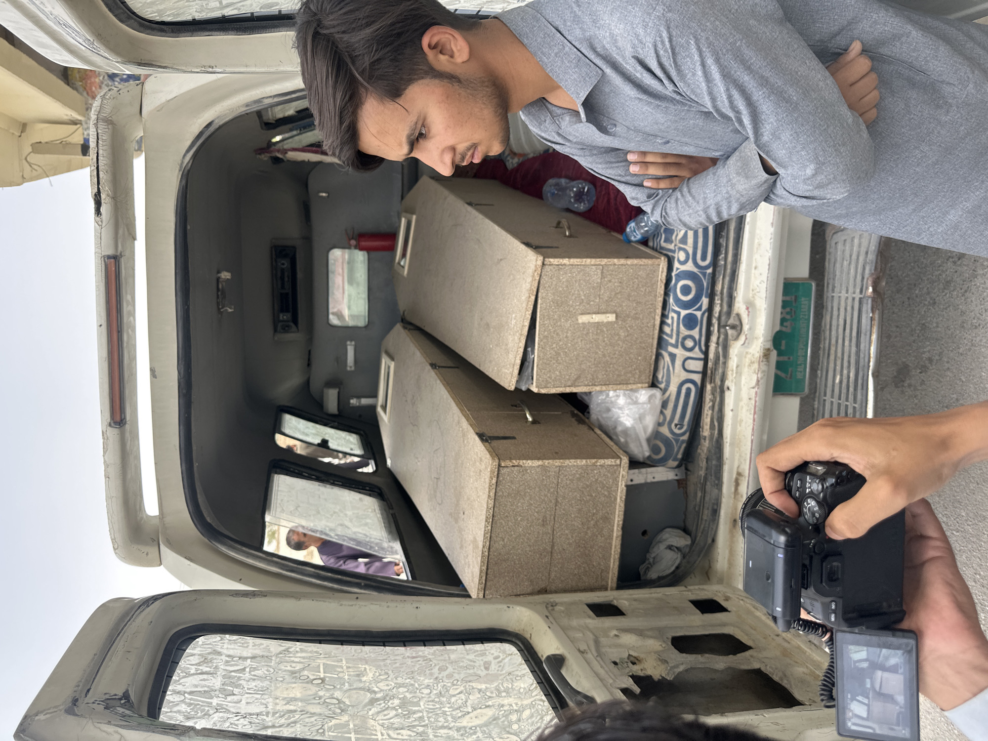 Two coffins loaded into ambulance in Quetta, Pakistan