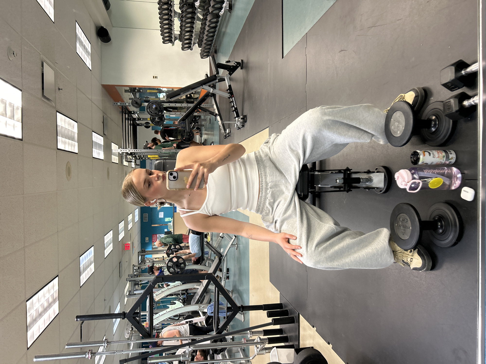 Woman takes gym selfies in Whistler fitness center