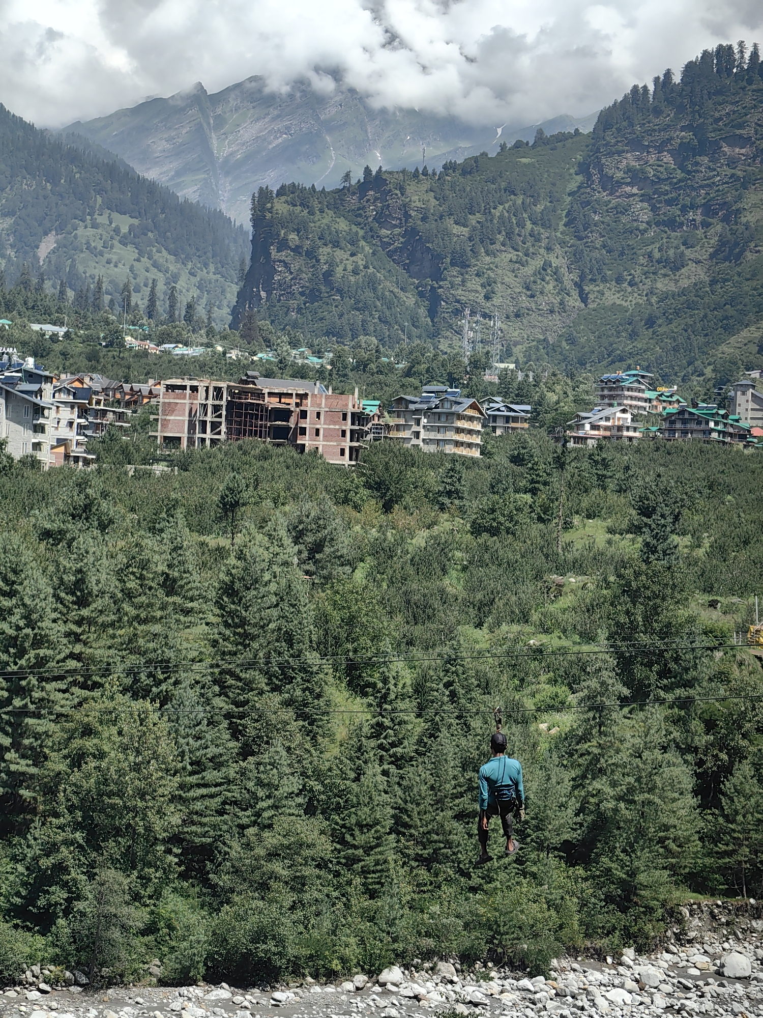 Mountain life in Kullu valley: ziplines, livestock trucks, and winding roads