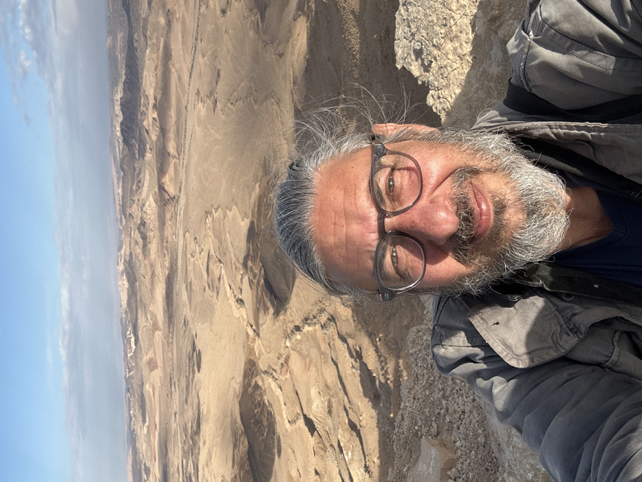 Tourist captures selfie at Ramon Crater cliff edge