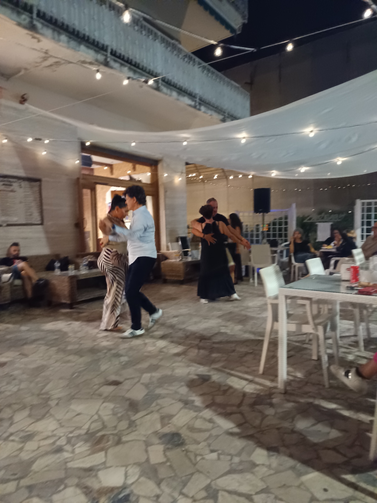 Evening dancing gathering at Zanzibar restaurant in Pineto, Italy