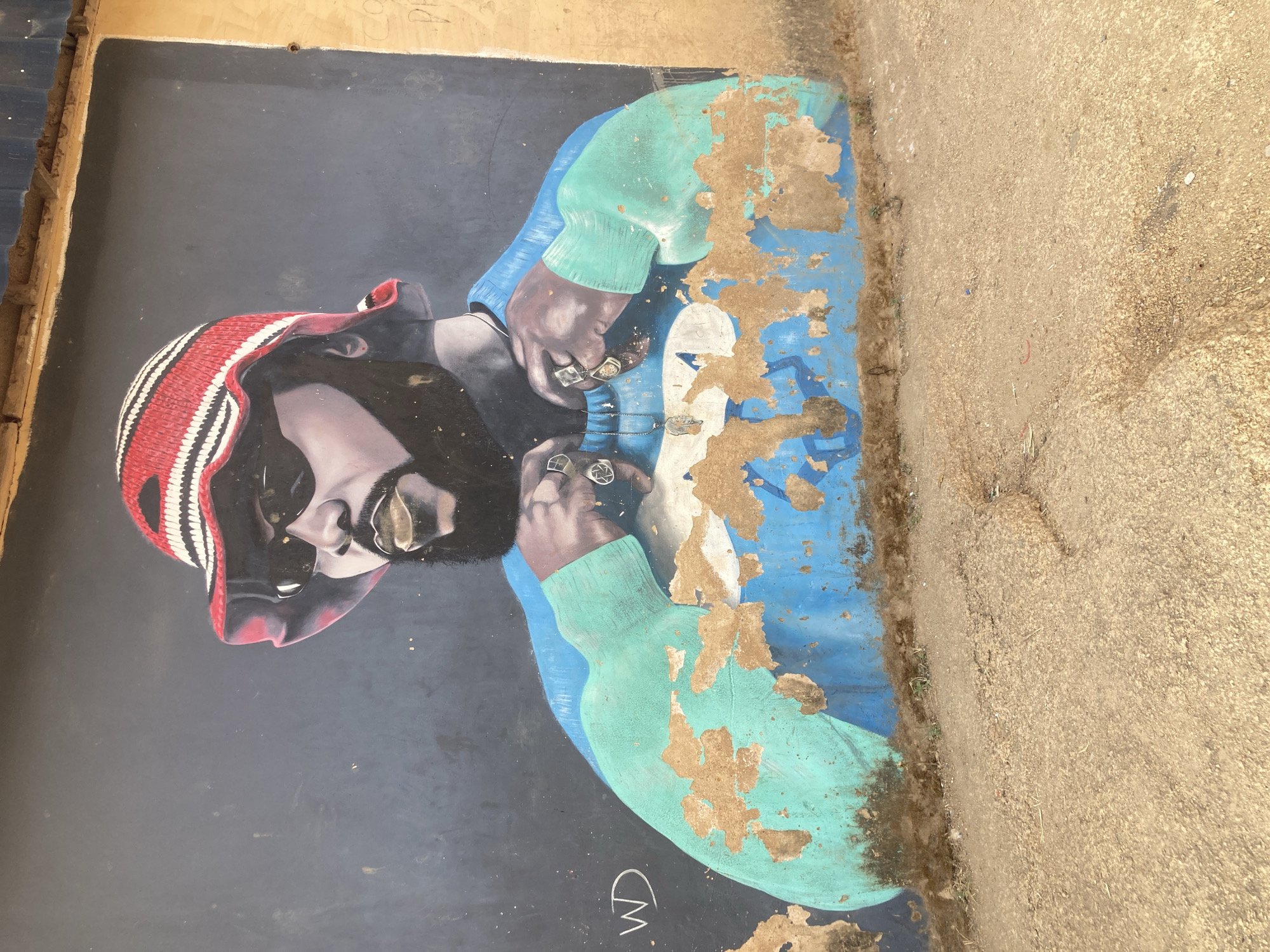 Street mural spotted in Jos shows man with jewelry