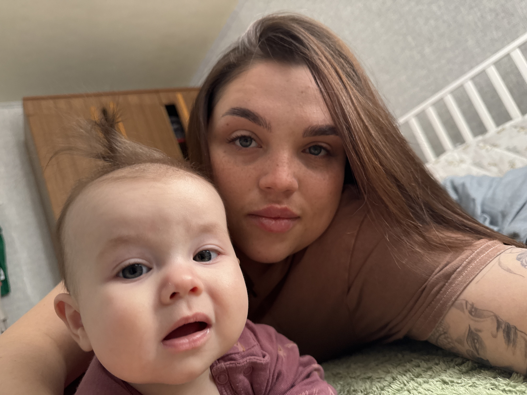 Mother and baby photographed together at home in Bataysk
