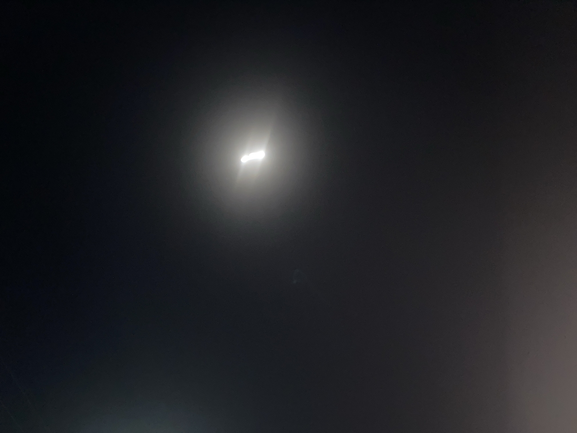 Person documents nighttime activities in low-visibility outdoor environment